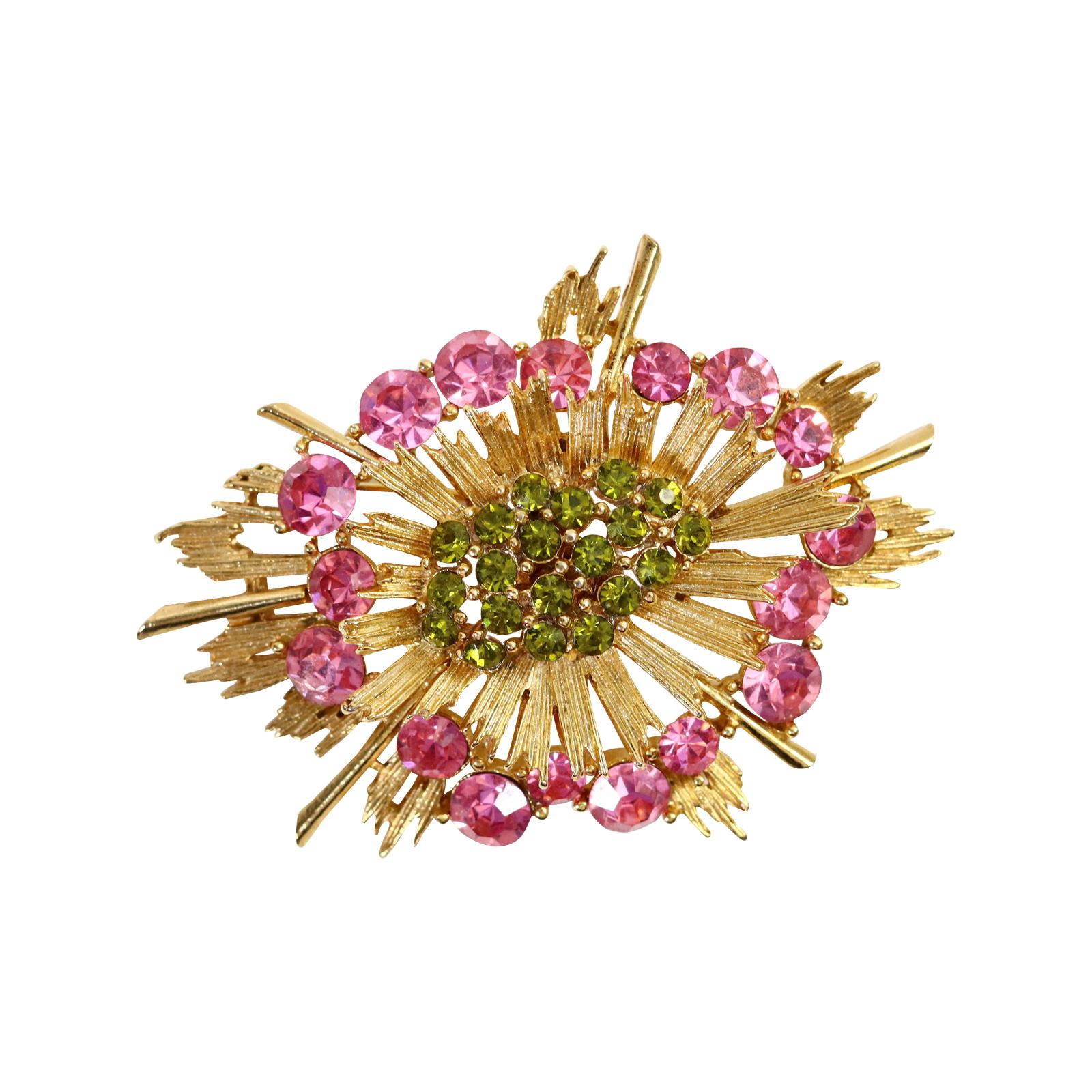 Vintage Lisner Gold with Green and Pink Crystals Brooch Circa 1980s. This brooch has three layers with the pink stones at the bottom and then a layer of gold and then a layer of green stones at the top all with very modern uneven edges of gold.  So
