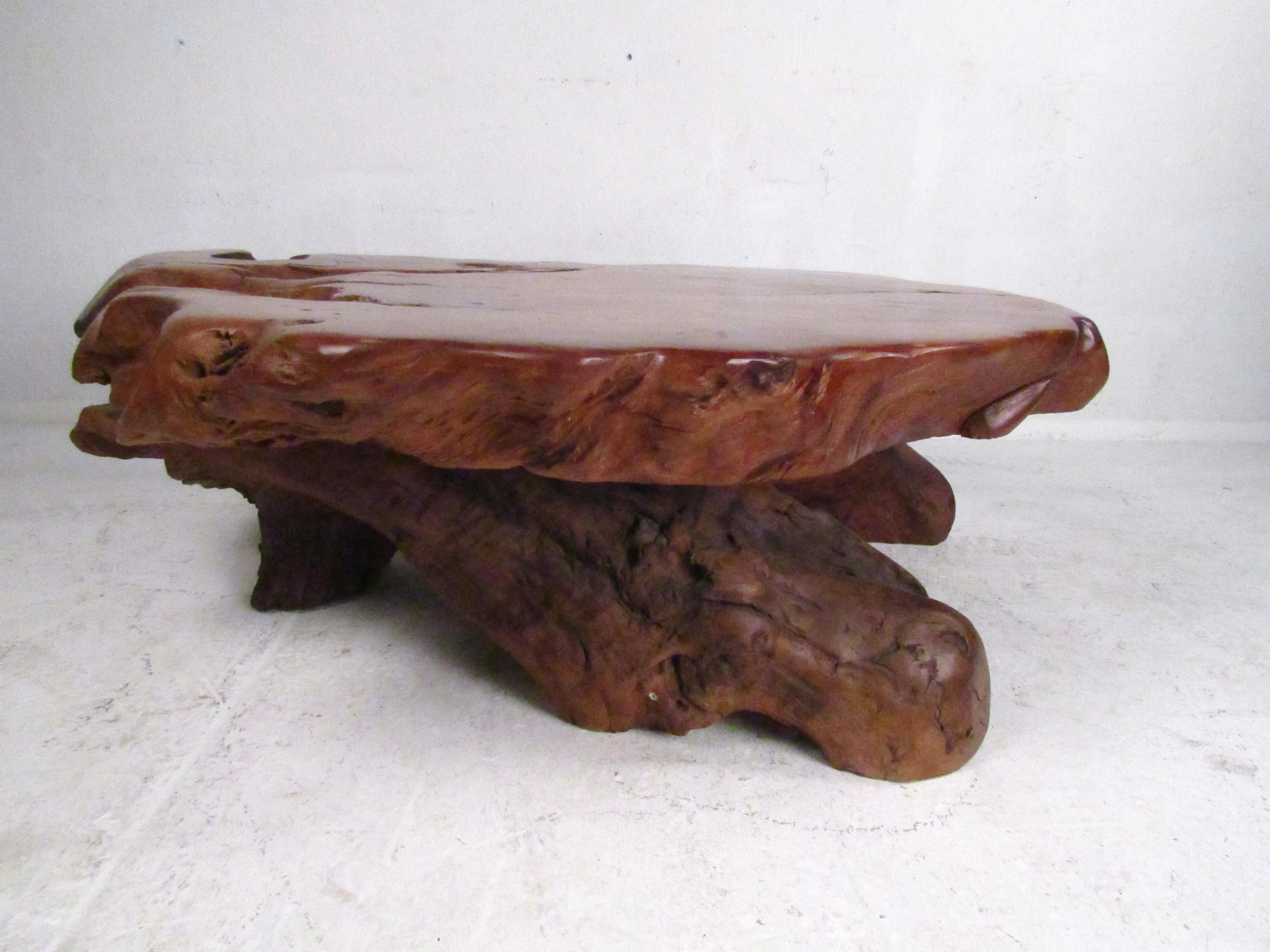 Stunning live-edge coffee or cocktail table. A sizeable slab serves as the tabletop. Interesting addition to any modern interior. Please confirm item location with dealer (NJ or NY).