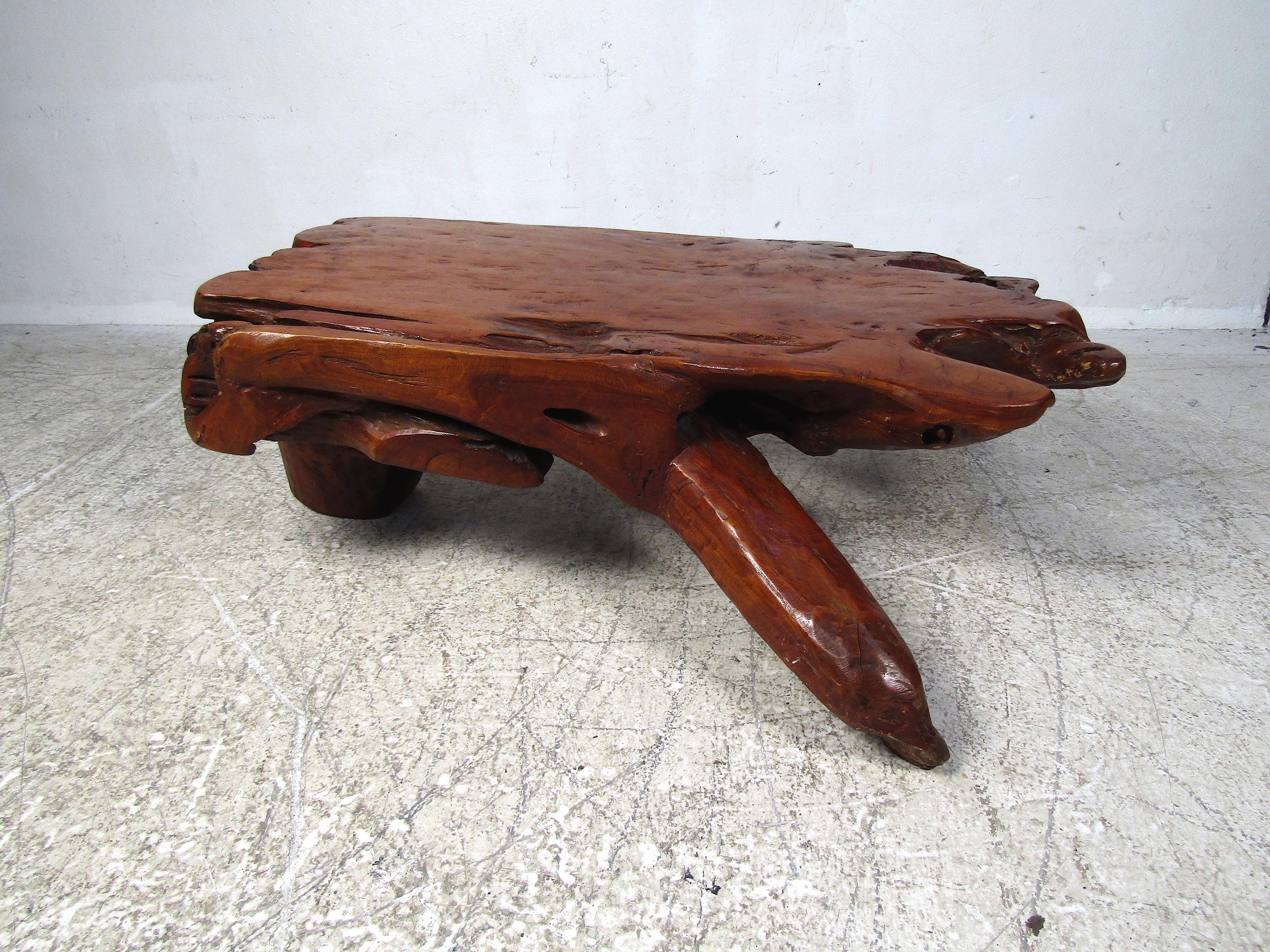 Interesting live-edge coffee table. Covered in a lacquer finish. Please confirm item location with dealer (NJ or NY).