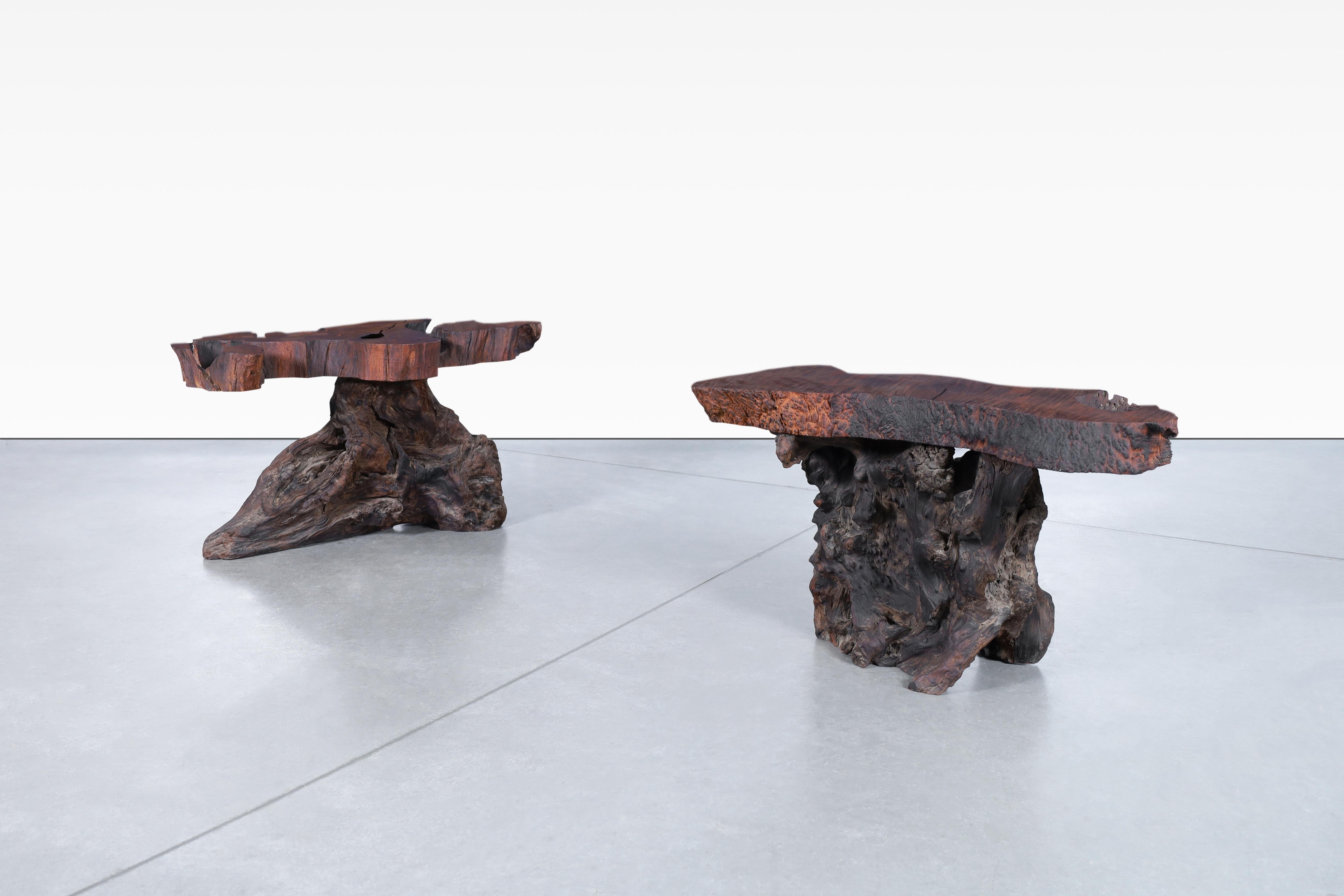 Fabulous vintage live edge redwood burl side tables, designed in the United States, circa 1960s. These redwood tables are unique, handmade designs. The live edge design captures the raw, unrefined essence of the wood, adding a touch of nature's