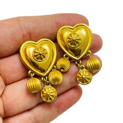 Vintage LIZ CLAIBORNE matte gold tone dangle heart designer clip on earrings
