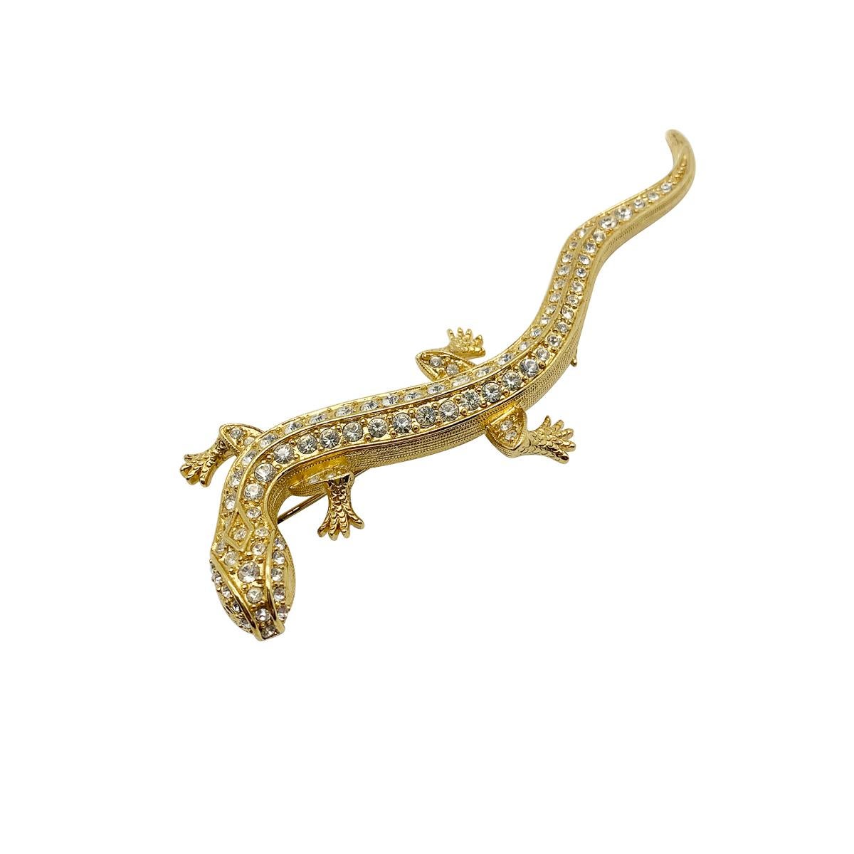 An impressive Vintage Statement Lizard Brooch. Featuring a wonderfully long lizard design set with crystals for a perfect finish. Incredible quality.

Vintage Condition: Very good without damage or noteworthy wear. 
Materials: Gold plated