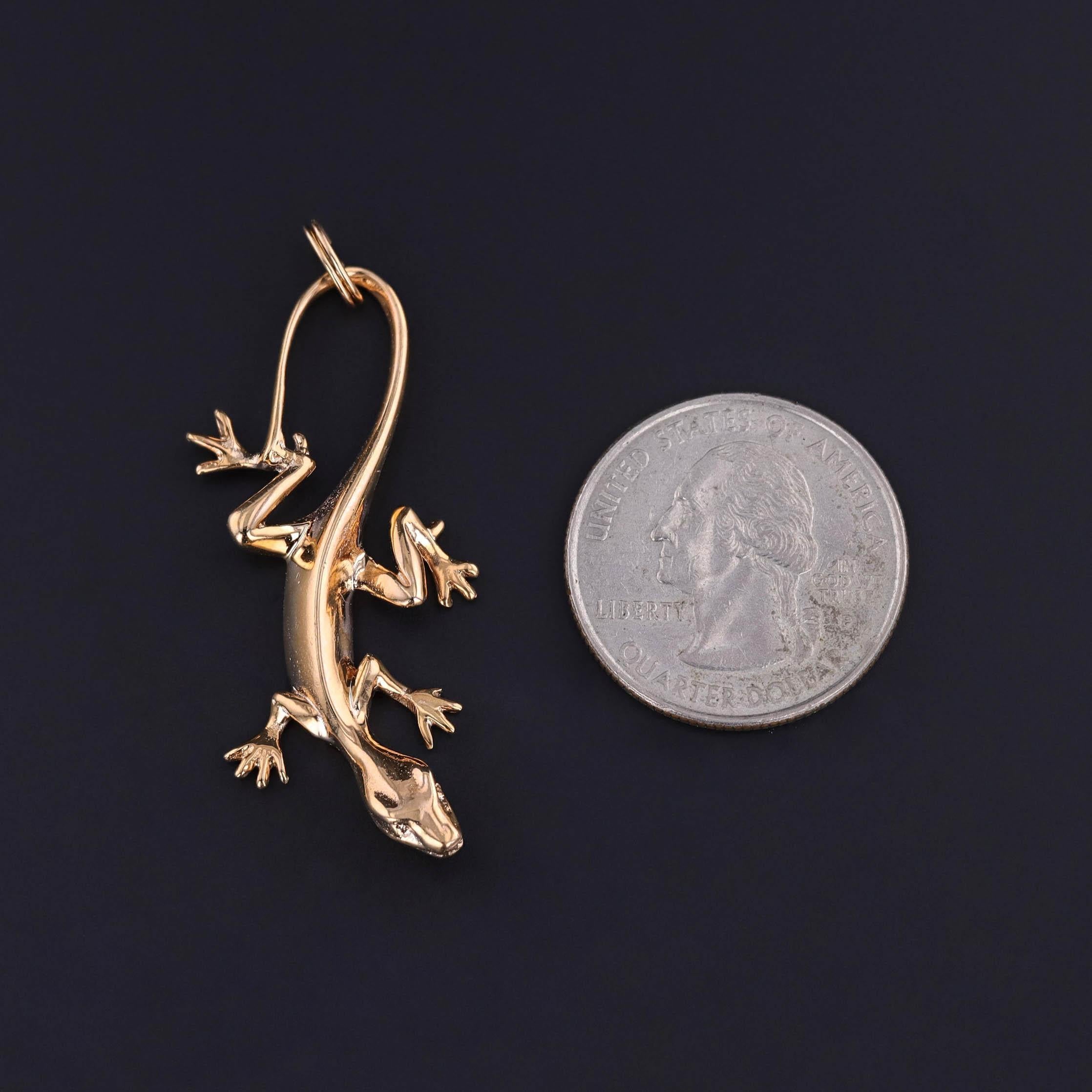 Sleek and symbolic, this pendant began its life as a vintage brooch from the 1950s before being thoughtfully transformed for modern wear.

The design showcases a finely sculpted polished lizard in 14k gold, its smooth contours and lifelike detail