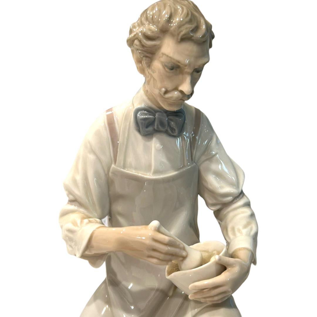 This vintage Lladro figurine titled “Pharmacist” is a beautiful piece of art made from delicate porcelain.  Crafted in Spain, this collectible will be a great addition to any decorative collection.  The intricate details of the figurine make it a