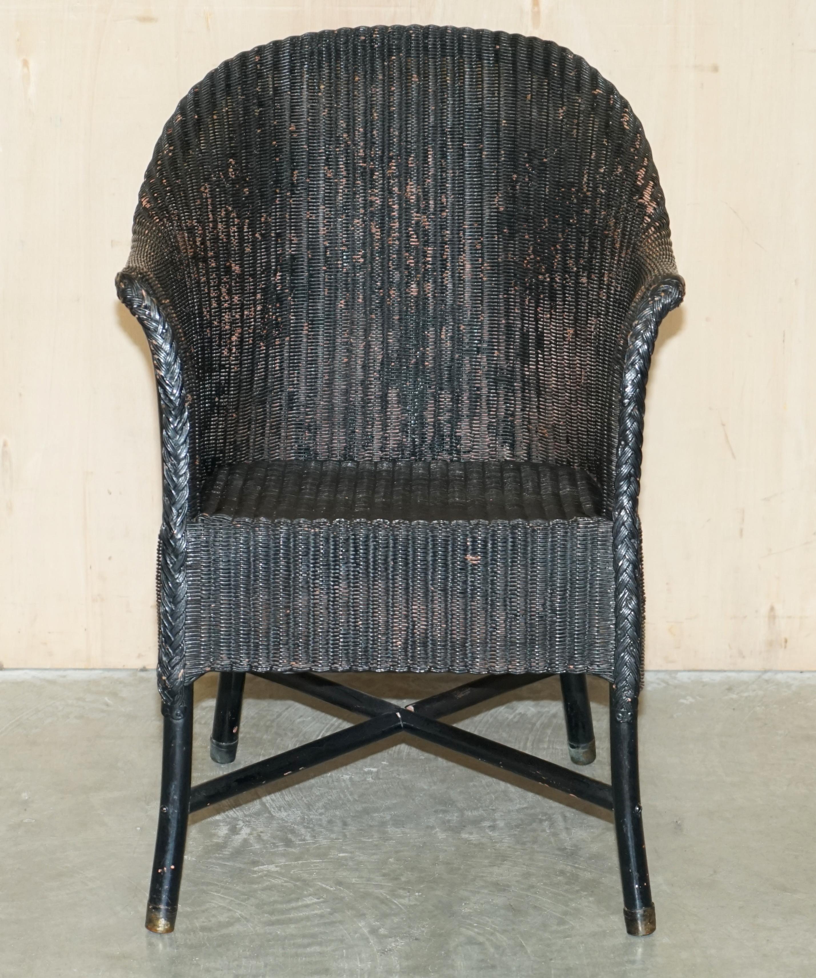 fauteuil lloyd loom ancien