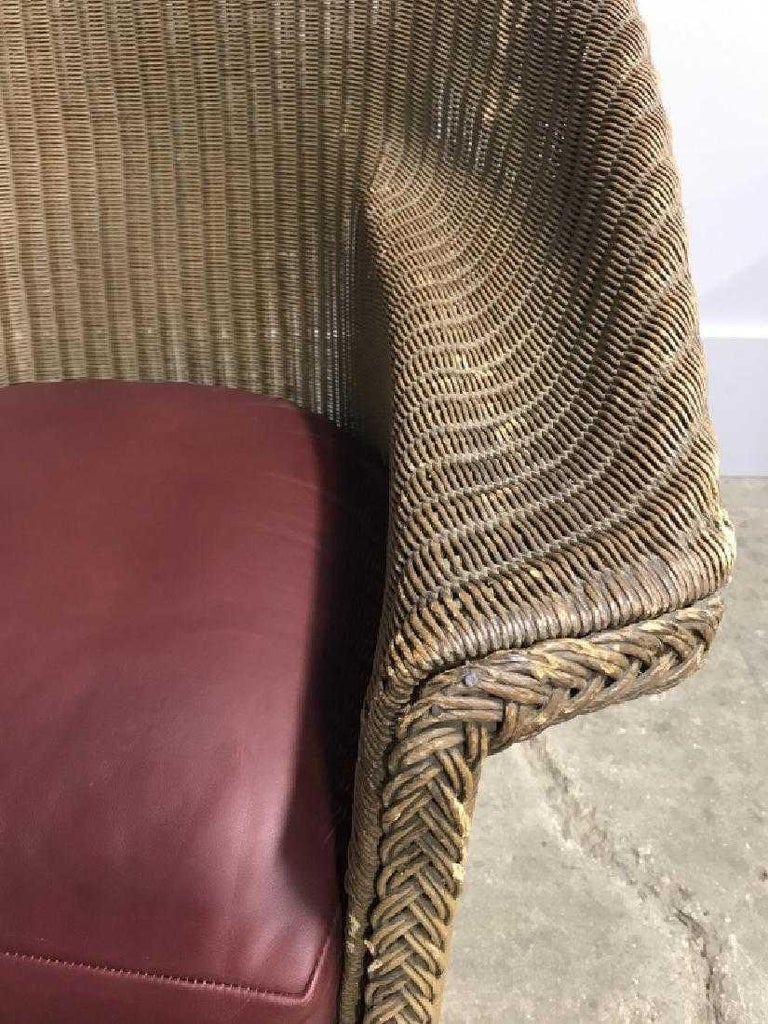 Vintage Lloyd Loom Style Brown Wicker Rocking Armchair with Cushion at