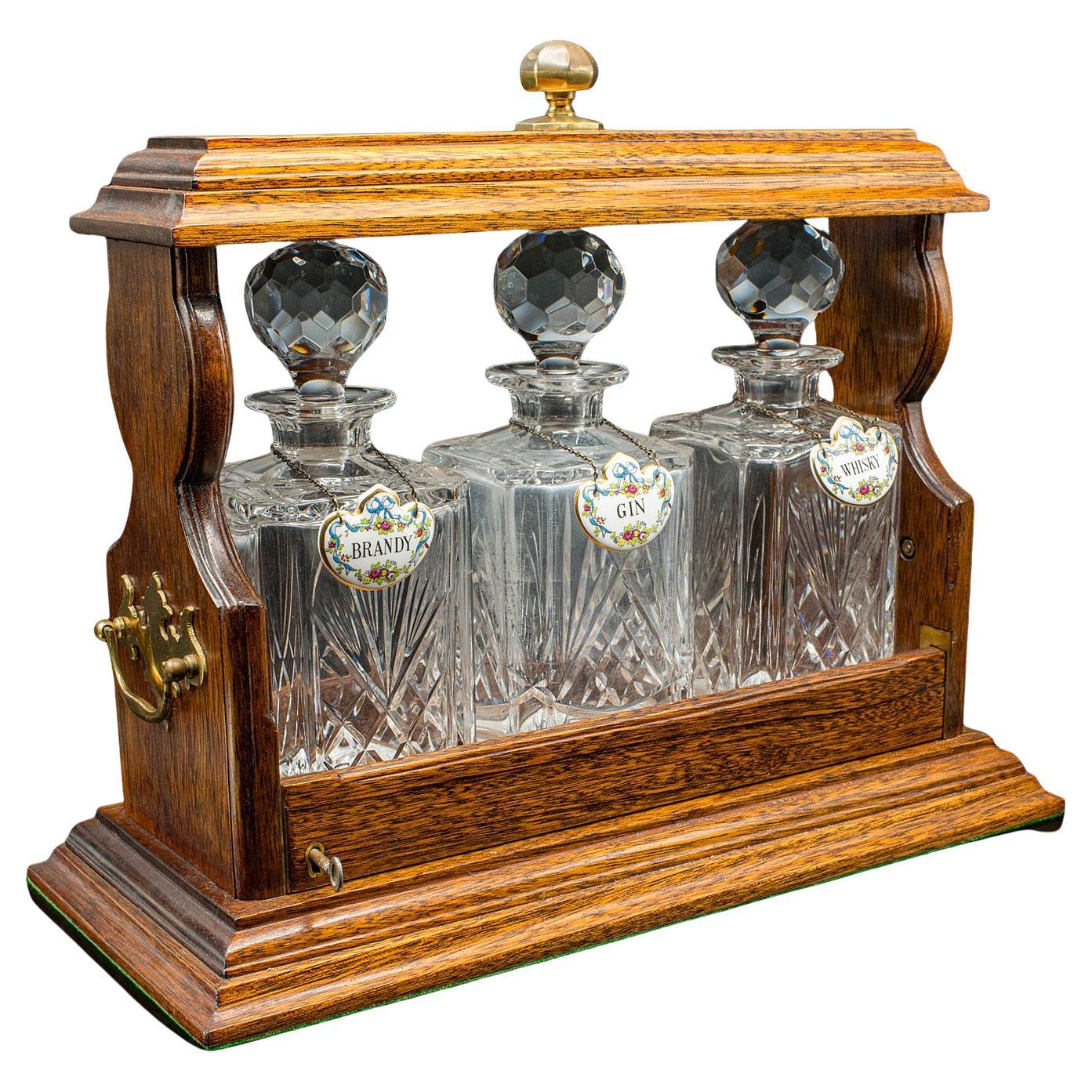 Dekanterdose Tantalus mit Verschluss, englisch, Eiche, Glas, Dekanterdose, viktorianisch im Angebot