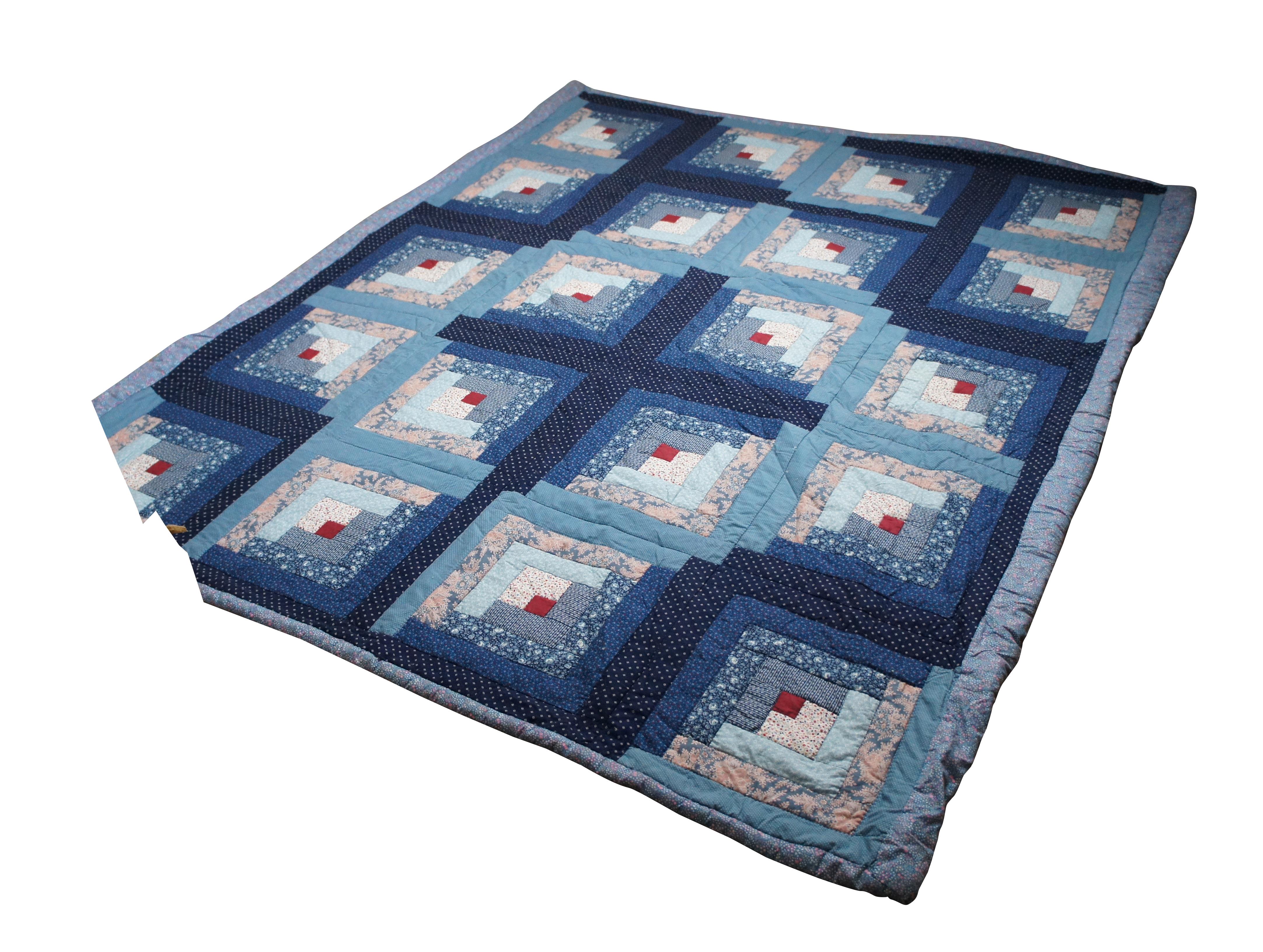 Vintage hand stitched quilt, blanket, comforter, bedspread featuring the traditional Log Cabin geometric design with squares, crosses and floral motifs. Full to queen size.

The Log Cabin block pattern is the oldest of quilt designs, and perhaps the