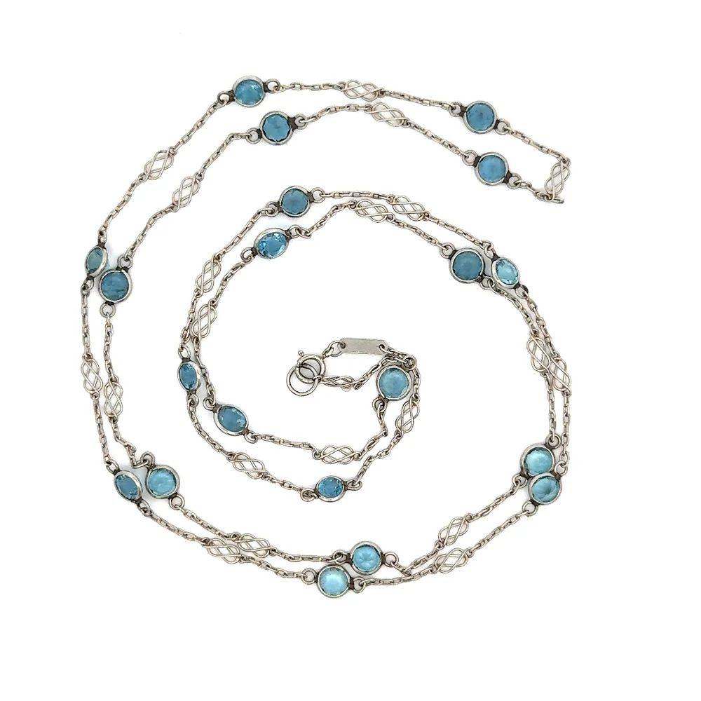 Simply Beautiful! Elegant and Finely detailed Oscar worthy Long Aquamarine Gemstone Platinum Necklace. Featuring 16 Stations of Hand set Aquamarine Gemstones, weighing approx. 8.00tcw. Inter-spaced with Platinum Link Chain. Necklace measures approx.
