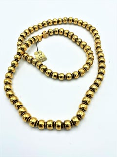 Vintage long necklace 'Jewel by TRIFARI' tag,  never worn, gold plated, 1950s US