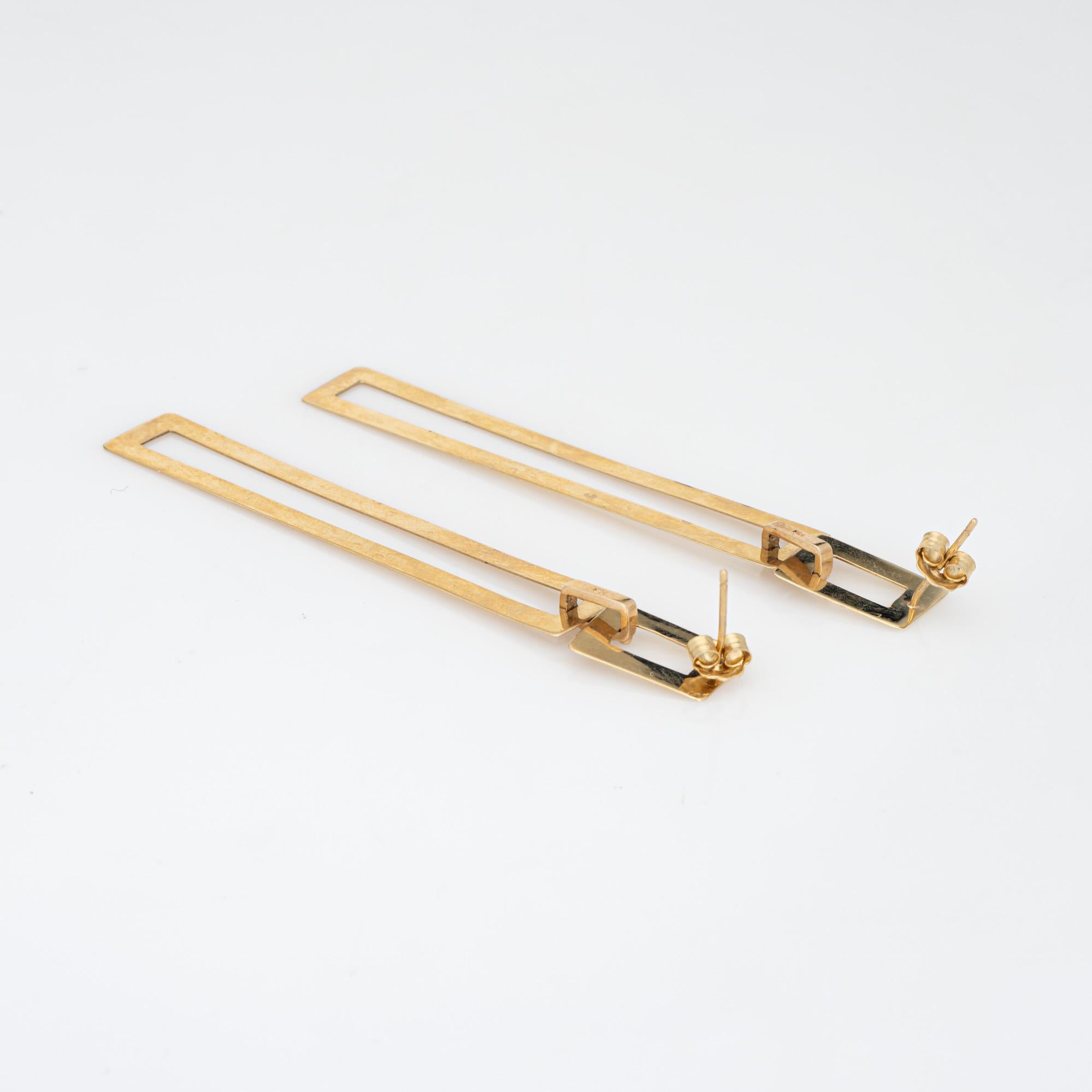 Elegant pair of vintage elongated square drop earrings crafted in 14k yellow gold (circa 1990s). 

The long and sexy elongated square drops measure 2 3/4 inches in length and make a great statement on the earlobe. The lightweight earrings weigh 4.2