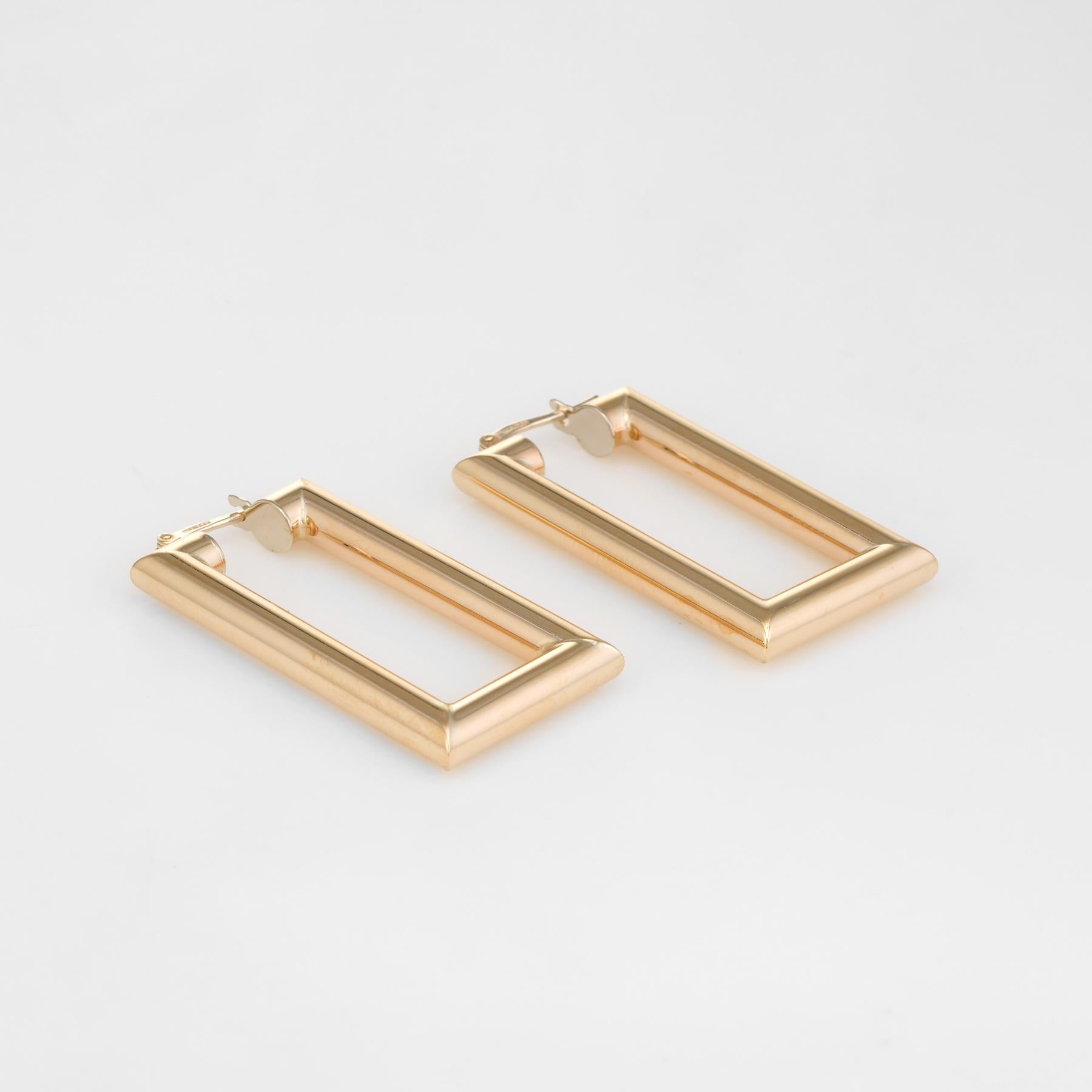 Elegant pair of square hoop earrings, crafted in 9k yellow gold. 

A surprising take on the more typical round hoop earrings, the square design makes a dramatic statement. The hollow tubular earrings have a nice lightweight feel (4.7 grams) yet sit