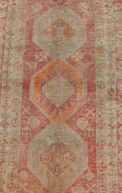 Vintage Long Turkish Oushak Runner with Tribal Medallions in Soft Red