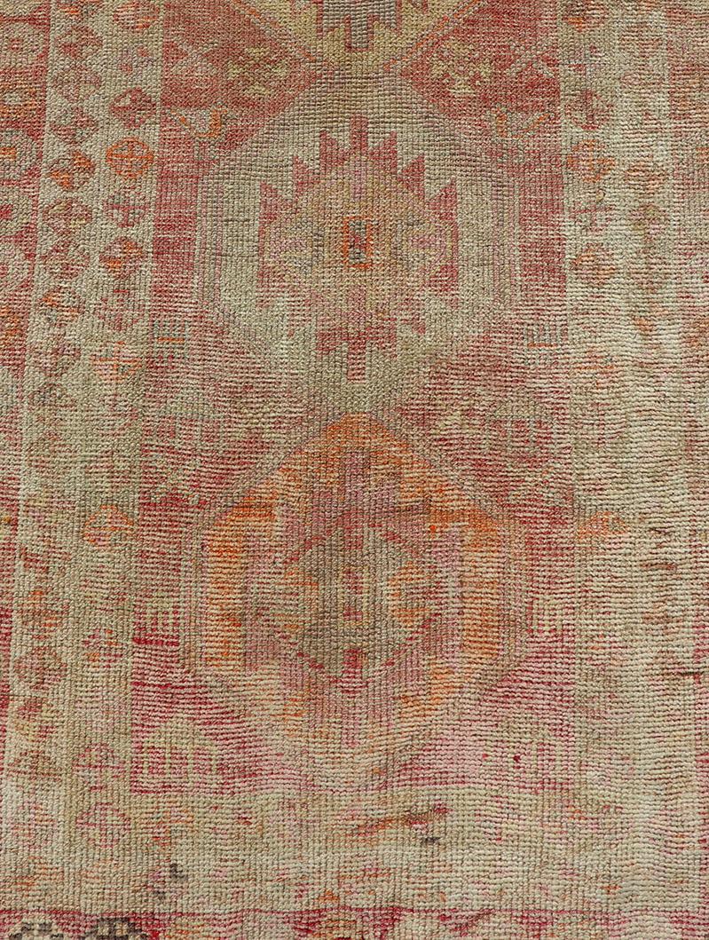 Vintage Long Turkish Oushak Runner with Tribal Medallions in Soft Red In Good Condition For Sale In Atlanta, GA