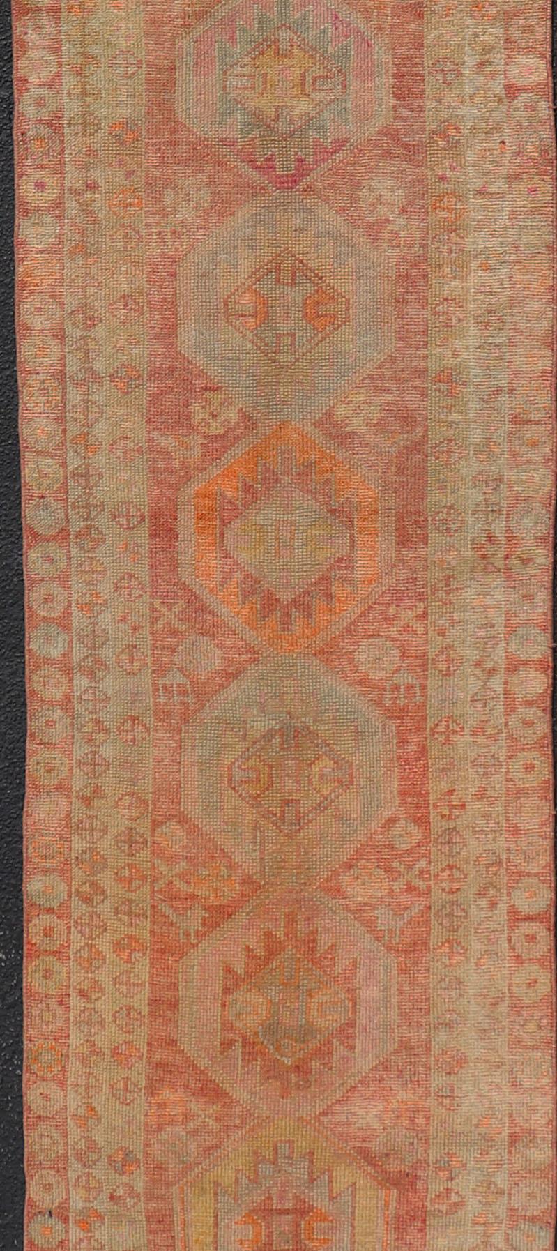 Vintage Long Turkish Oushak Runner with Tribal Medallions in Soft Red For Sale 1