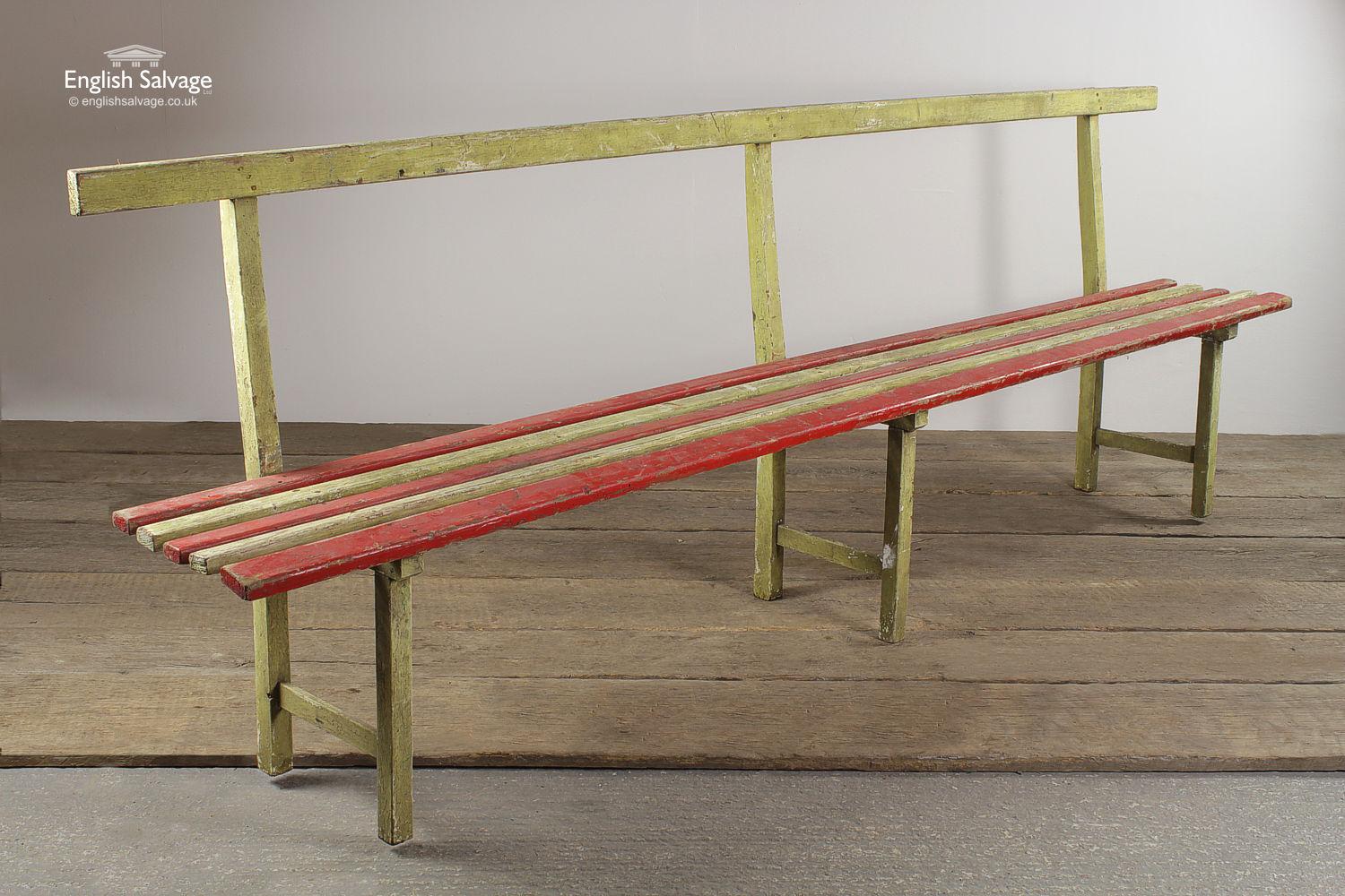 Reclaimed long narrow lightweight plank bench with a red and green paint finish. A colorful piece. This is a indoors bench.

Bench is rather lightweight! Could do with some reinforcement to help stabilise / strengthen it. Some of the paint finish