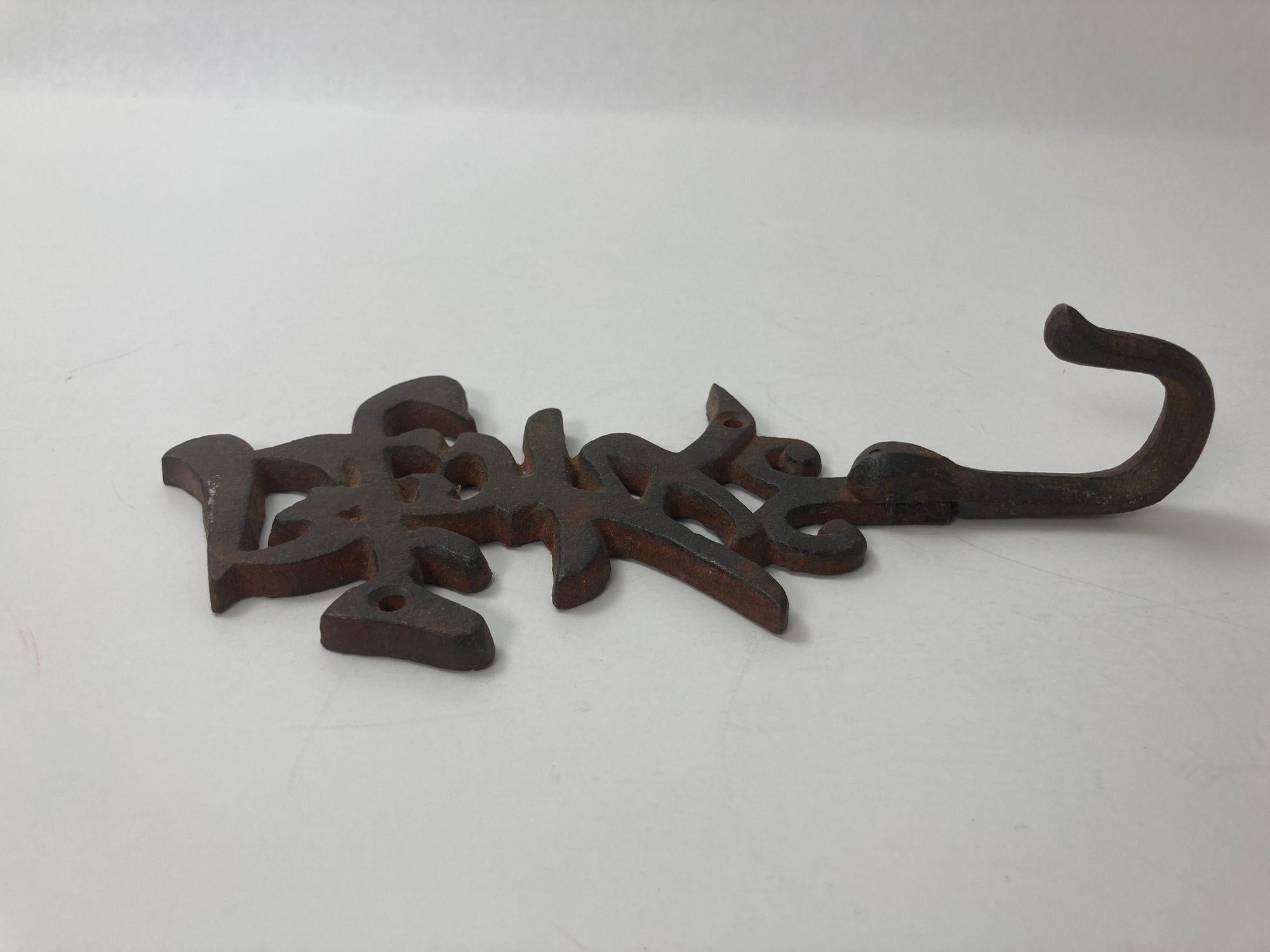 VIntage Longevity Chinese Symbol Iron Cast Wall Hook In Good Condition For Sale In North Hollywood, CA