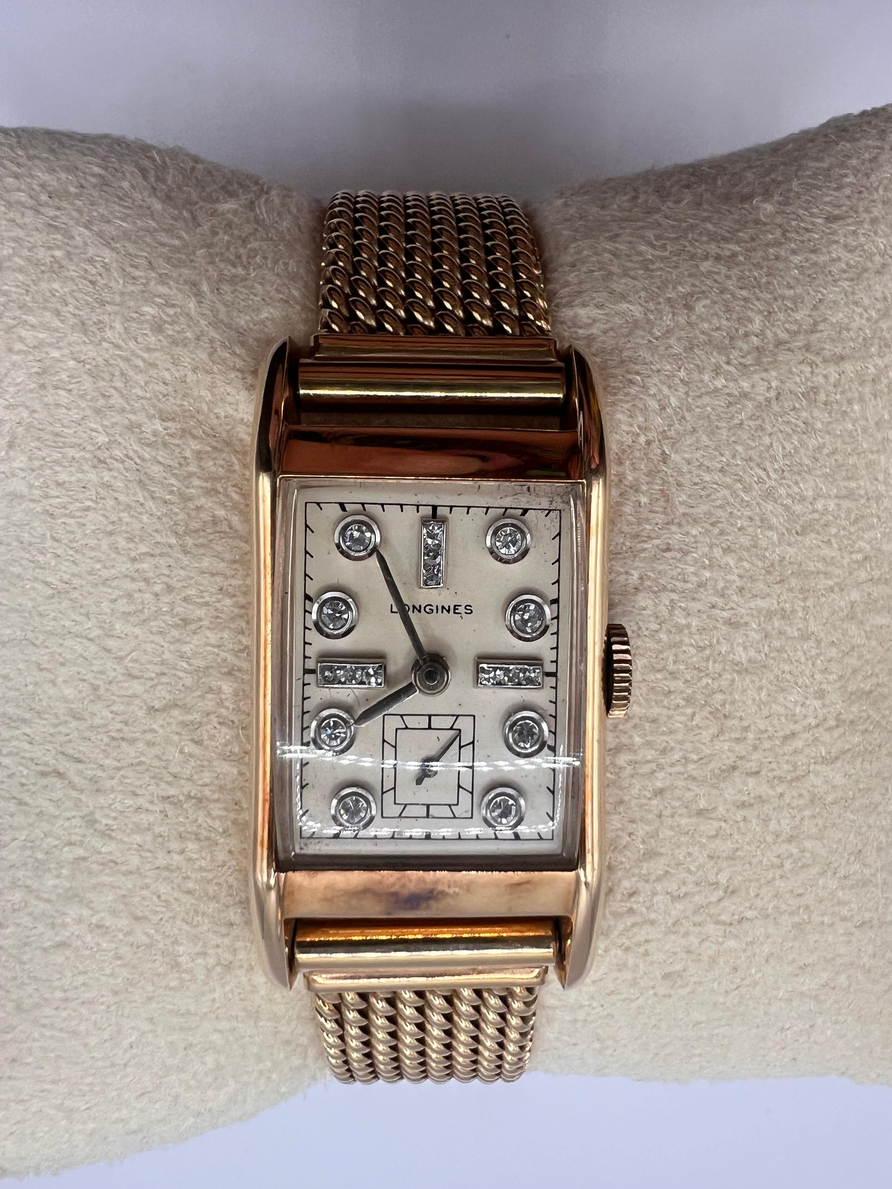 This Vintage Longines Tank Watch is a true treasure from the 1940s, weighing 59.71 grams and meticulously crafted in 14k gold with the hallmark of Swiss precision. Originating from Switzerland, this elegant timepiece features a diamond-set dial with