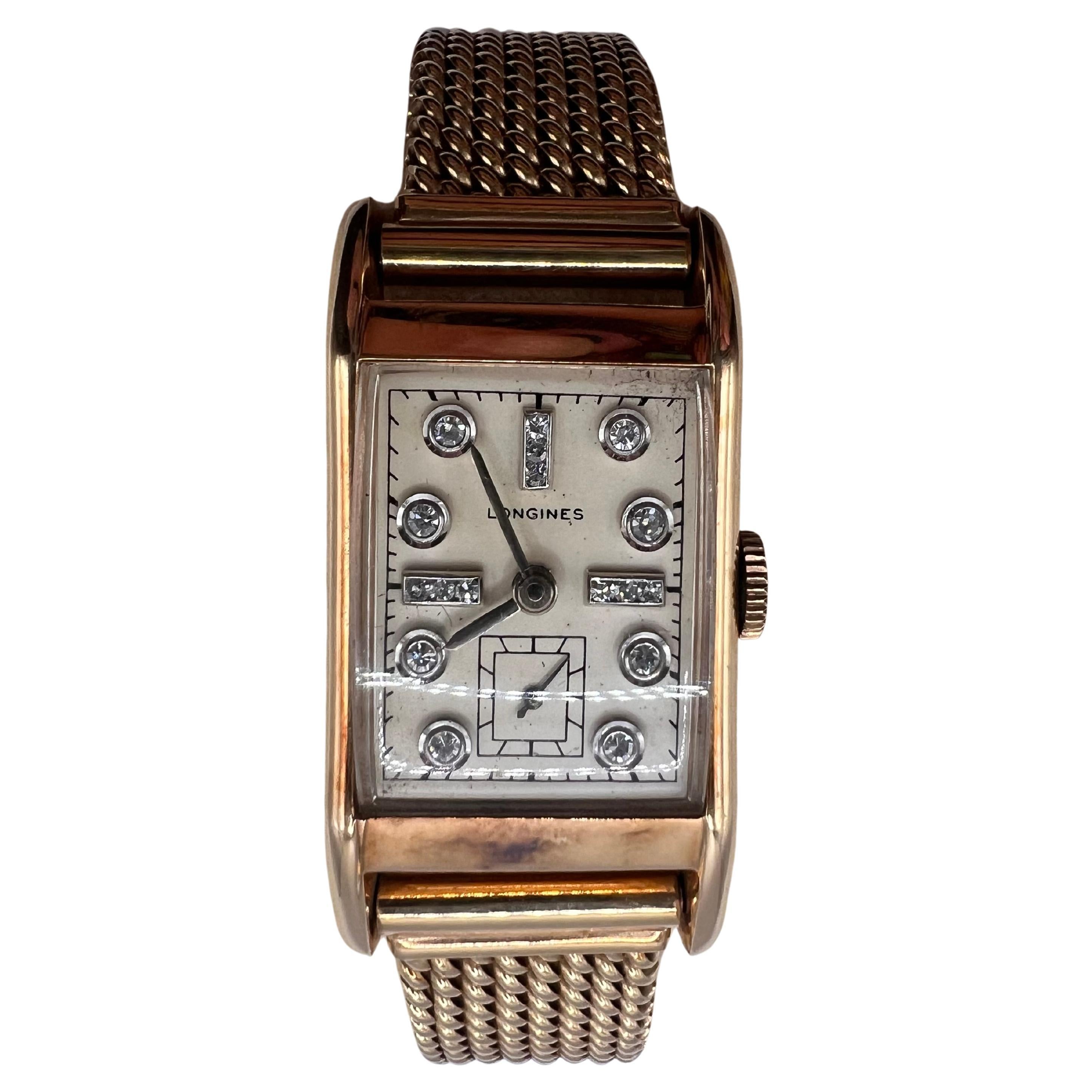 Reloj vintage Longines de oro de 14 quilates y esfera de diamantes