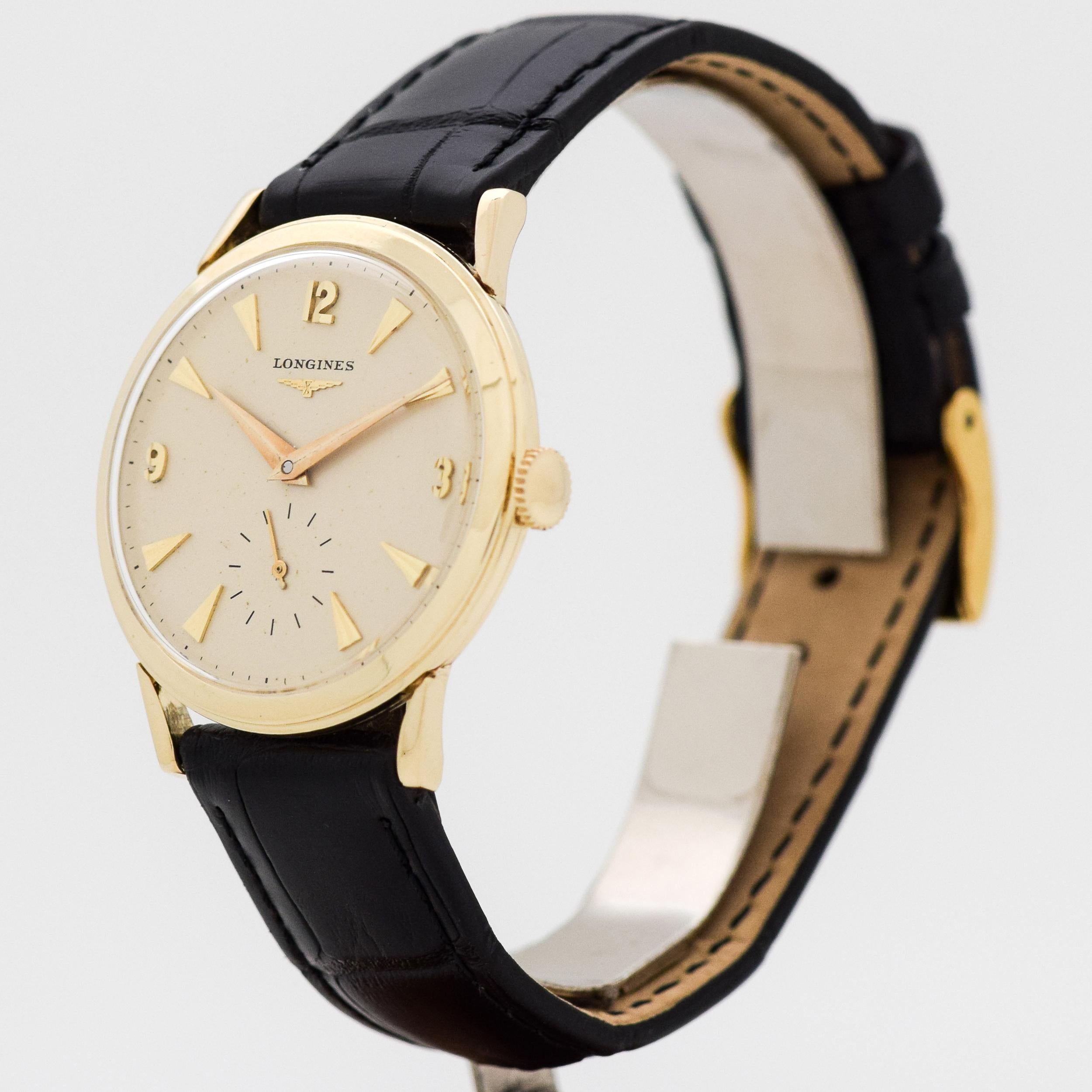 longines 14 karat gold watch