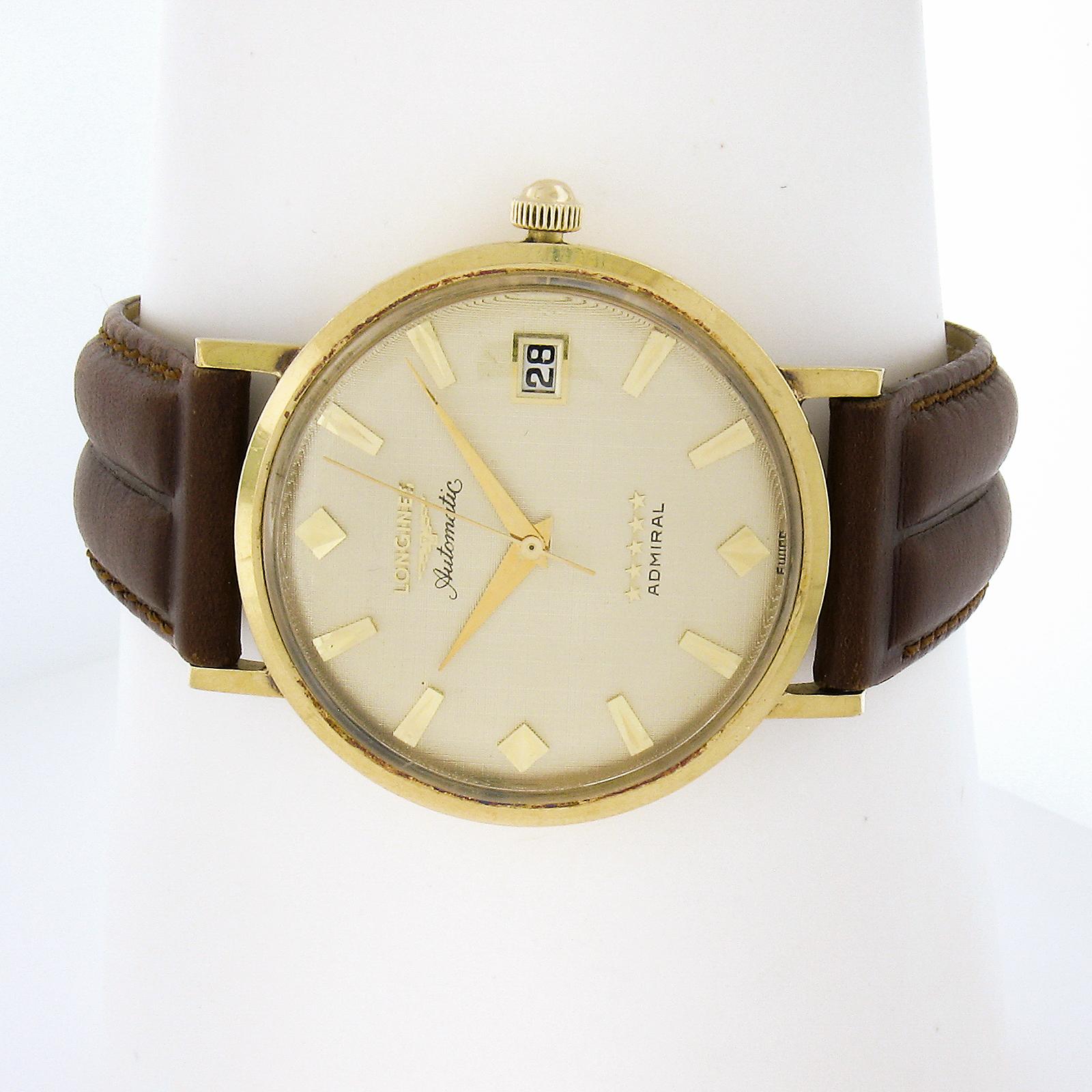 Watchmaker: Longines
Movement: Mechanical - Automatic-Winding - Swiss Made
Case Material: Solid 18k Yellow Gold
Gross Weight:	41.4 Grams (including case, movement, and strap)
Case Width: 34mm (not including crown)
Case Height: 40.5mm (lug to