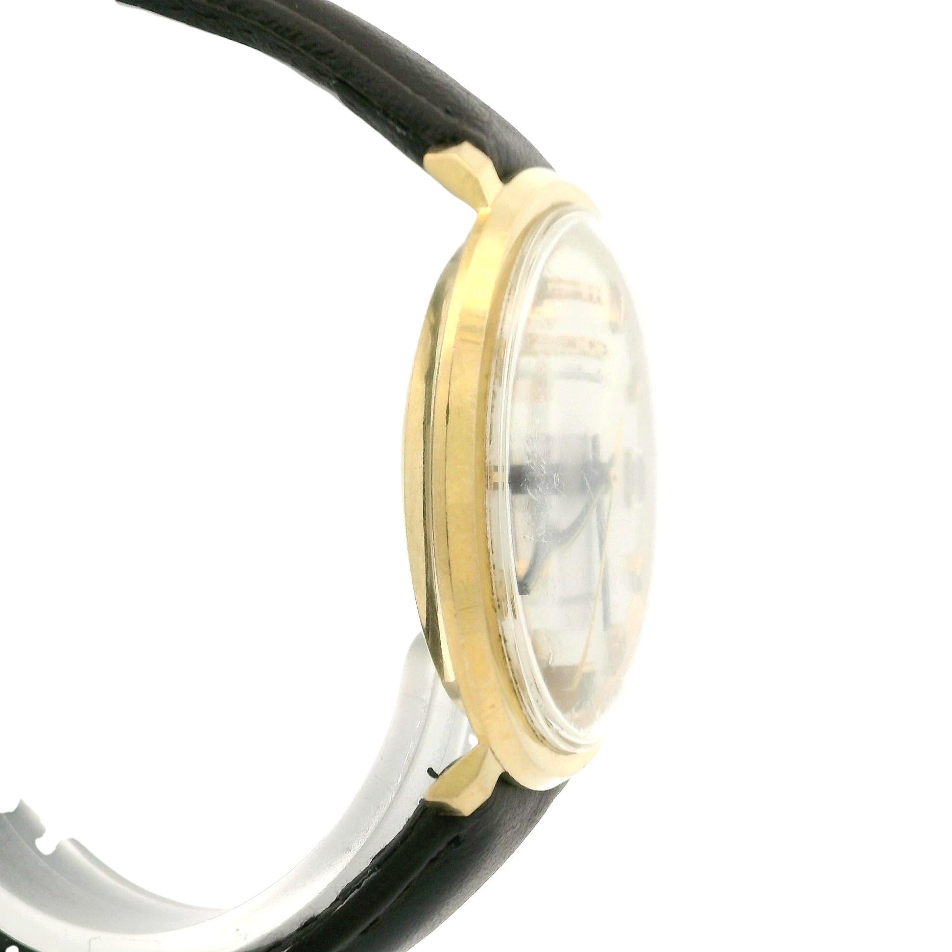 Watchmaker: Longines
Movement: Mechanical - Automatic-Winding - Swiss Made
Case Material: Solid 18k Yellow Gold
Gross Weight:	39.1 Grams (including case, movement, and strap)
Case Width: 35mm (not including crown)
Case Height: 36.4mm (lug to