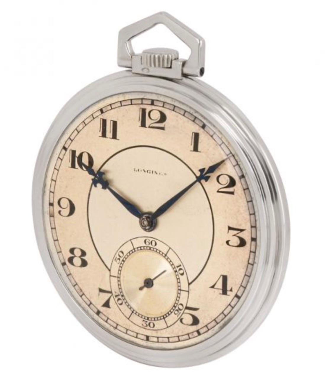 A rare Longines Art Deco slim keyless lever 44mm pocket watch in 18ct white gold, C1920s.

Dial: The beautiful two tone cream and silver dial signed Longines with black Arabic numerals, chemin de fer chapter ring subsidiary seconds register at six