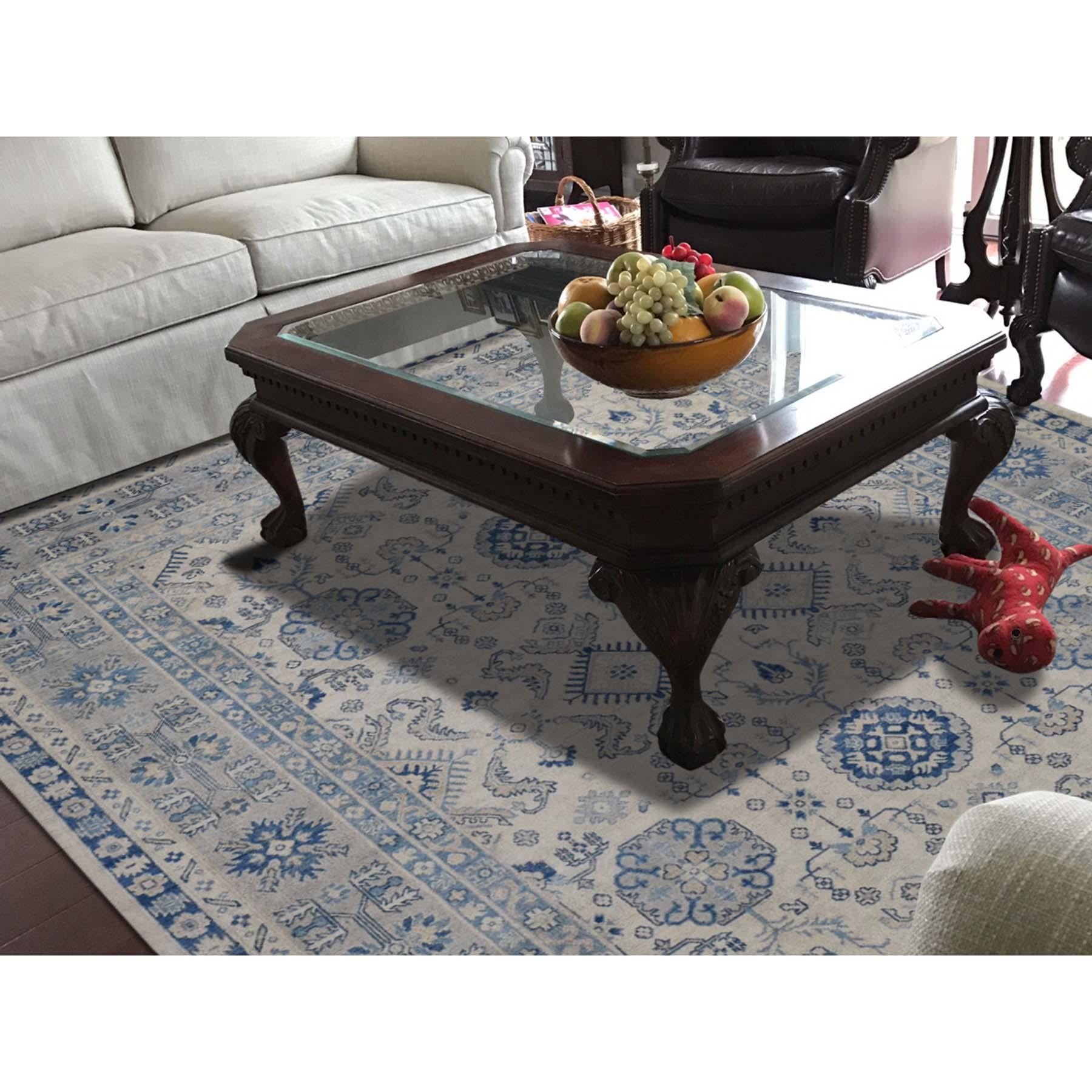 This is a truly genuine one-of-a-kind vintage look Kazak pure wool hand knotted Oriental rug. It has been knotted for months and months in the centuries-old Persian weaving craftsmanship techniques by expert artisans. Measures: 7'9