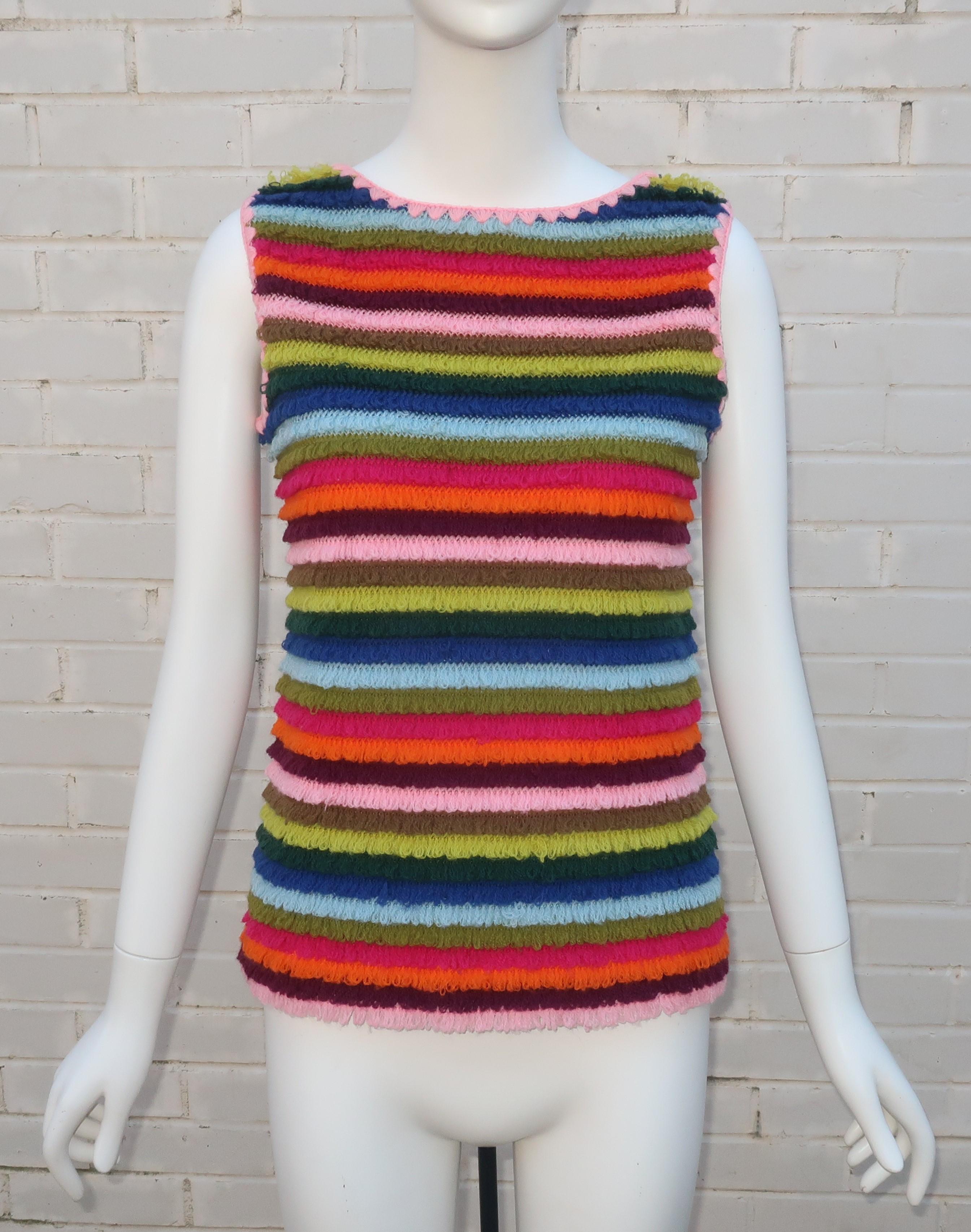 1960's Loubella of California looped wool yarn sweater vest.  The sleeveless pullover construction has a button keyhole closure at the back.  This fun piece sports a combination of happy colors including baby blue, pink, eggplant, lime green,