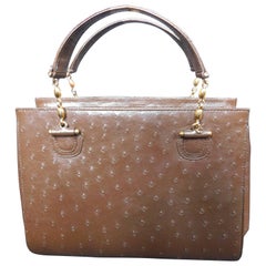 Vintage Lorenzi Brown Ostrich Skin Handbag with Gold Metal Handle accents