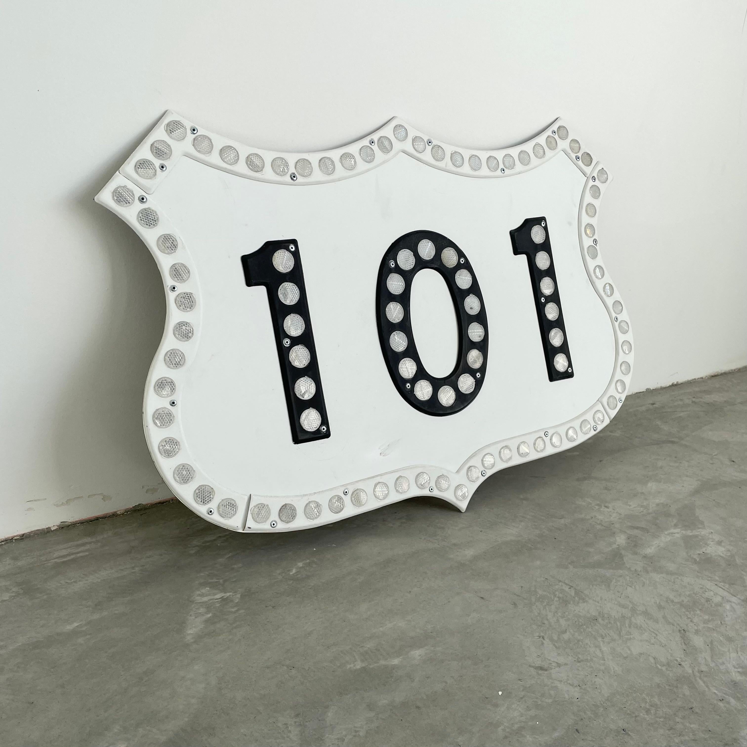 Super collectible sign from Los Angeles, California. 101 Freeway sign with all cats eyes reflectors intact. Originally on a massive green metal freeway sign. Excellent vintage condition. Extremely rare piece of Los Angeles, transportation ephemera.