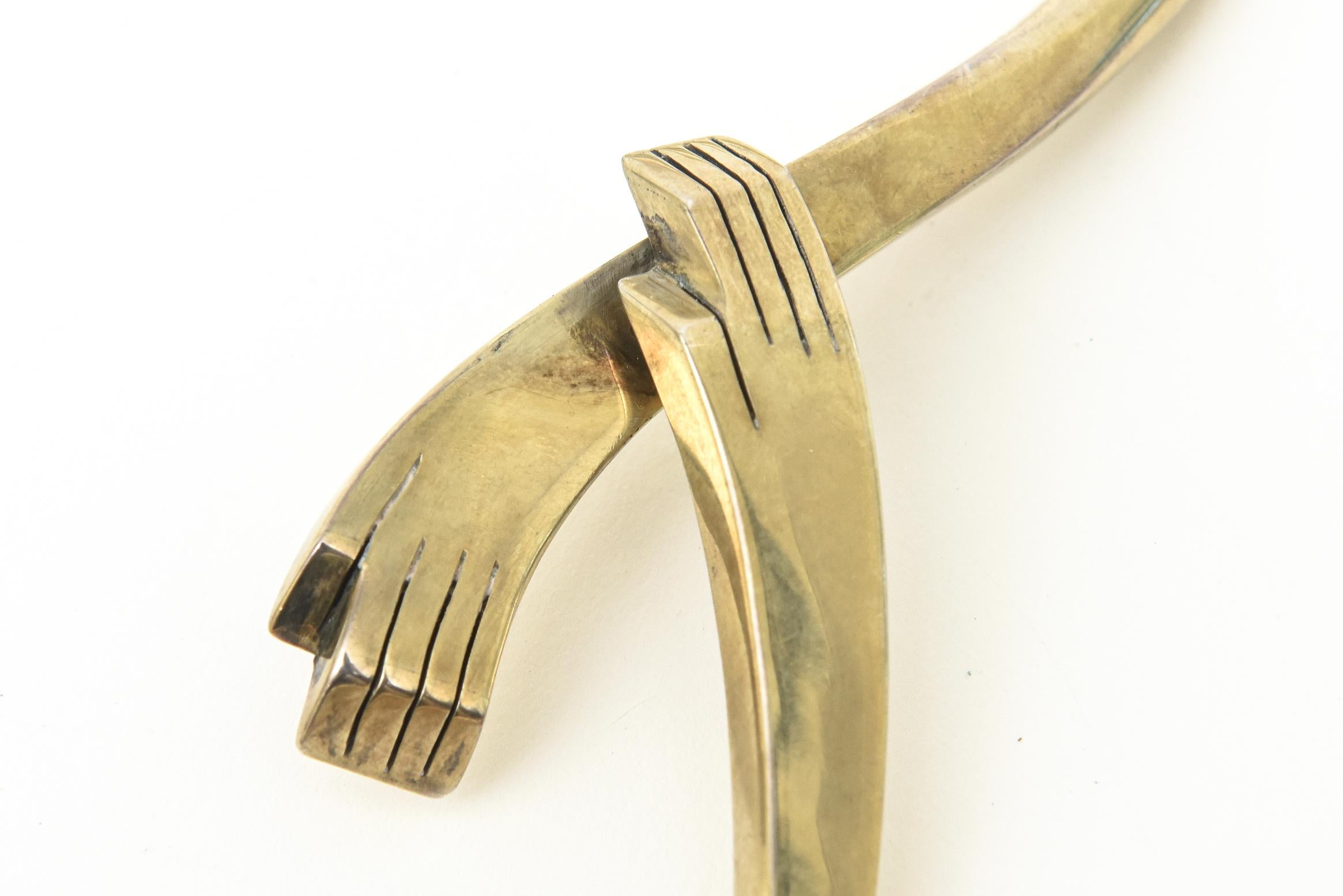 Modernist Vintage Los Castillo Marked Brass Interlocking Hands Collar Sculptural Necklace For Sale