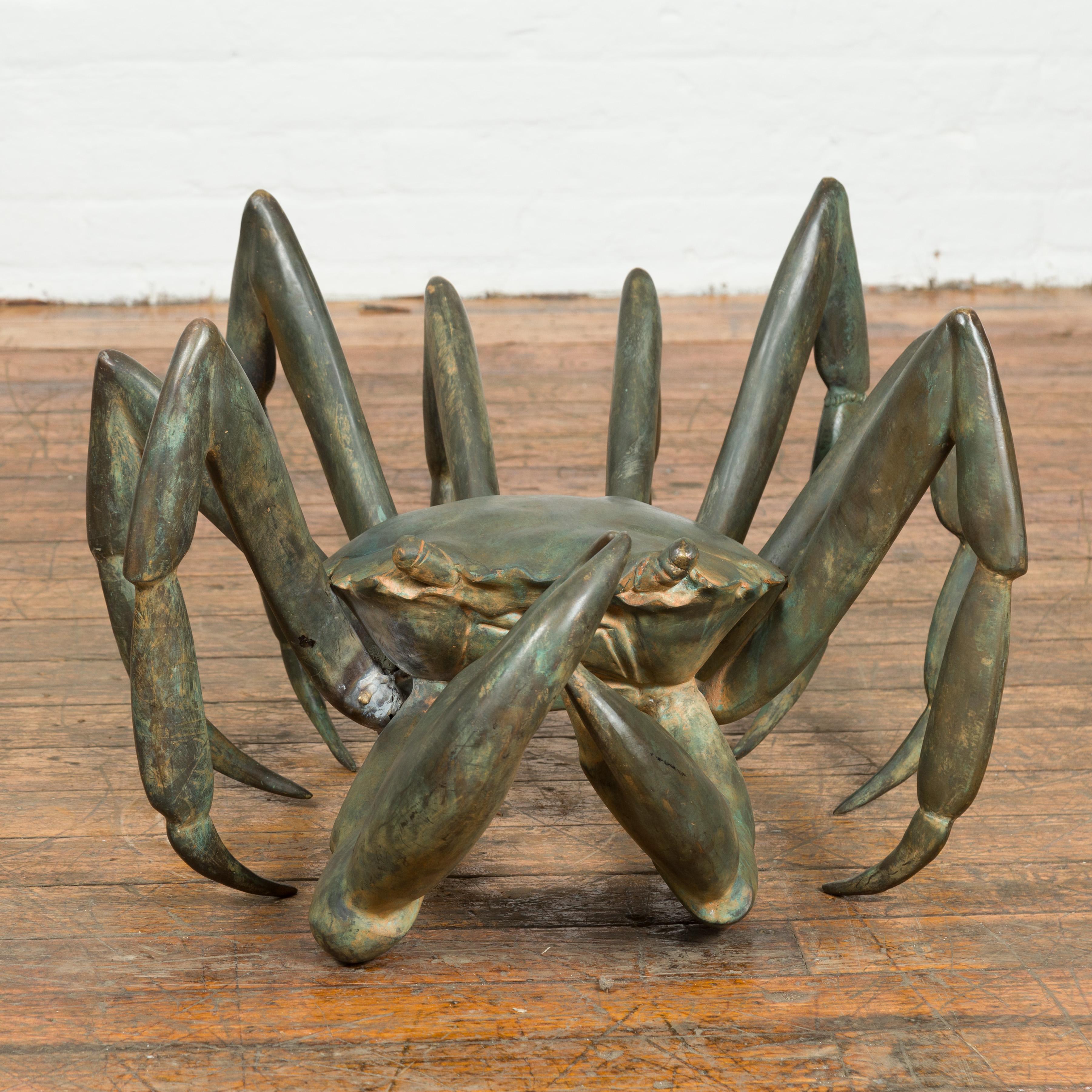 A vintage lost wax cast bronze crab coffee table base from the mid 20th century, with verdigris patina. Talk about making a statement in a living room! Created with the traditional technique of the lost-wax (à la cire perdue) which allows for great