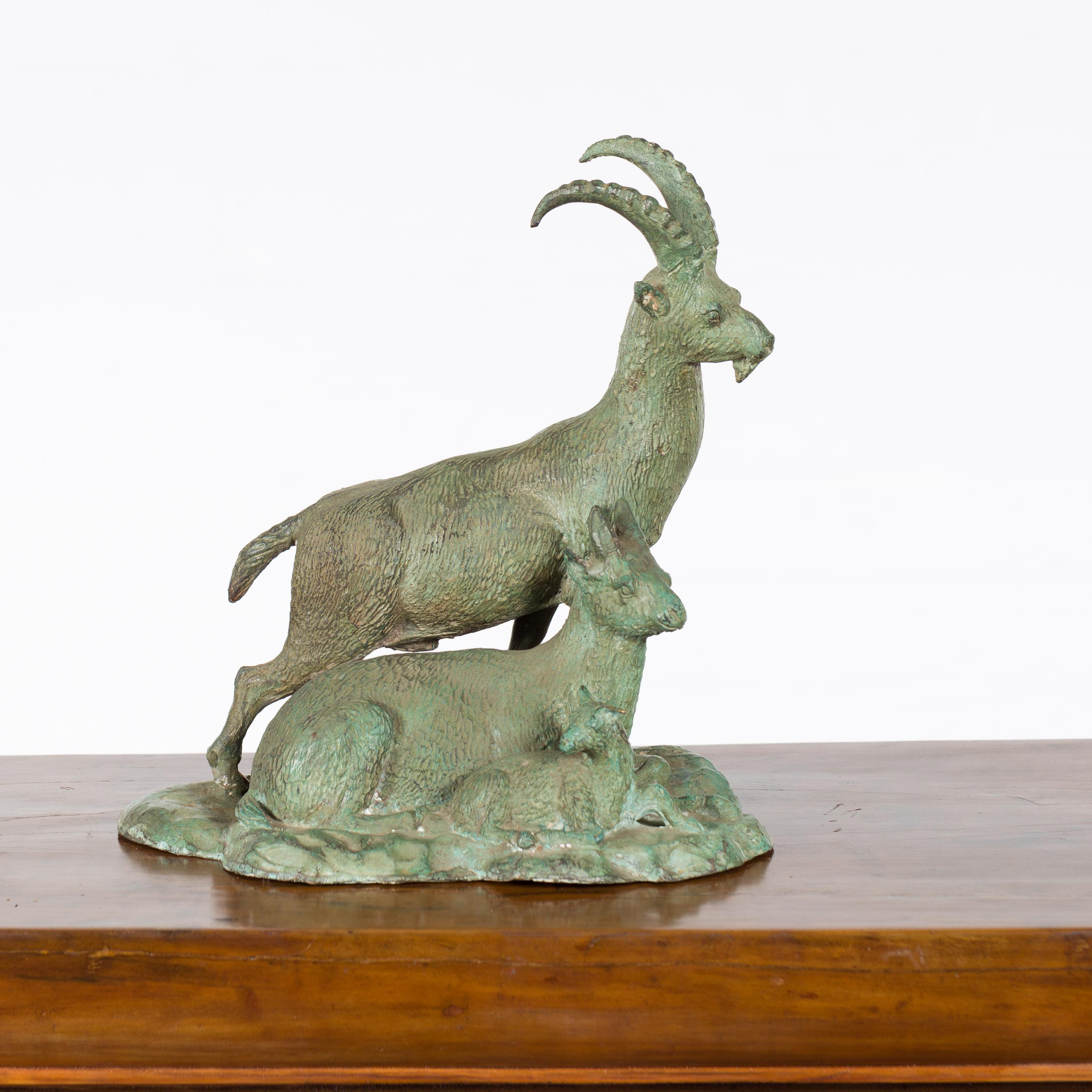 A vintage bronze family of Ibex sculpture on base from the mid 20th century, with verde patina. Created with the traditional technique of the lost-wax (à la cire perdue) which allows for great precision and finesse in the details, this sculpted