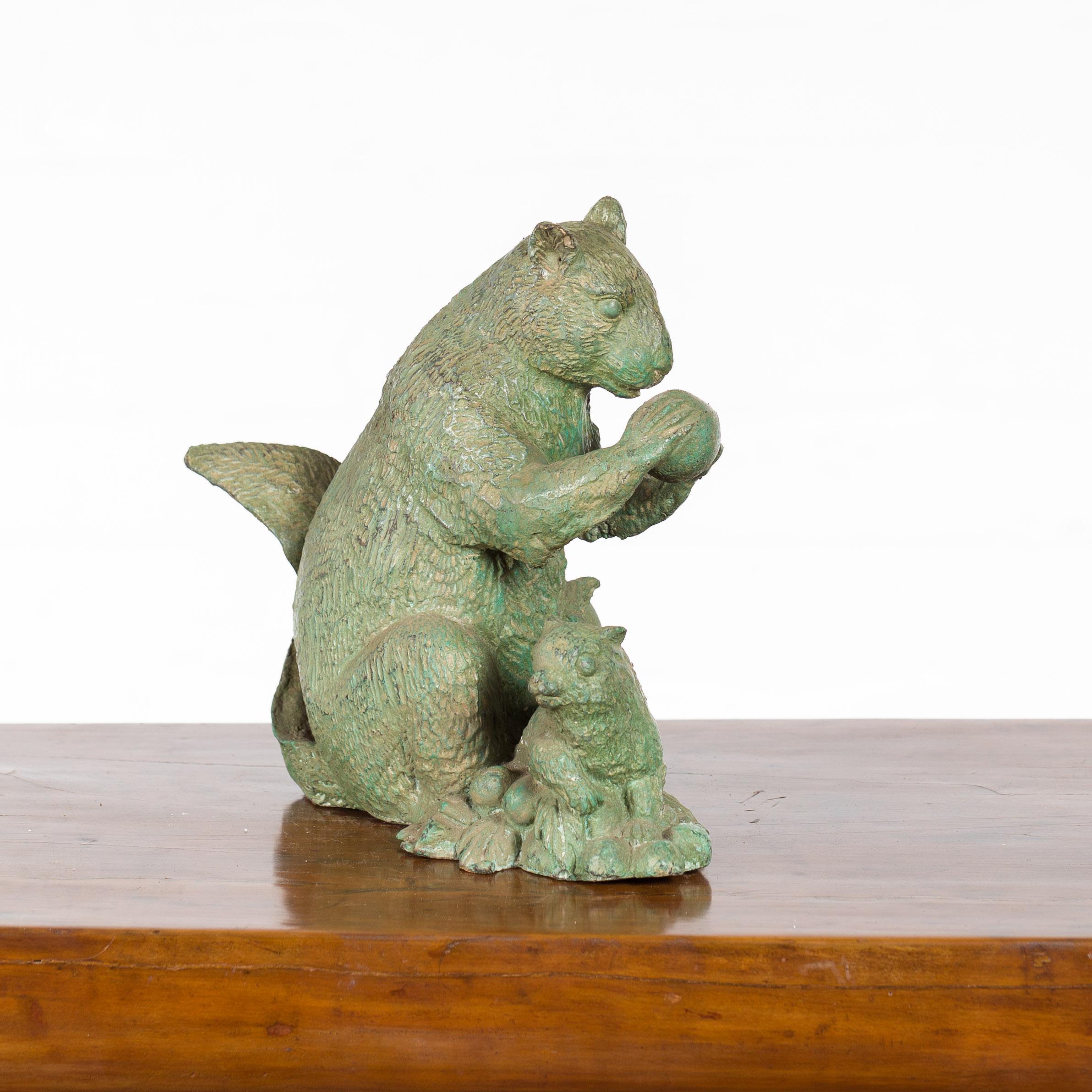 A vintage lost wax cast bronze squirrel family sculpture from the mid 20th century with verde patina. We have three available, priced and sold individually. Created with the traditional technique of the lost-wax (à la cire perdue) which allows for