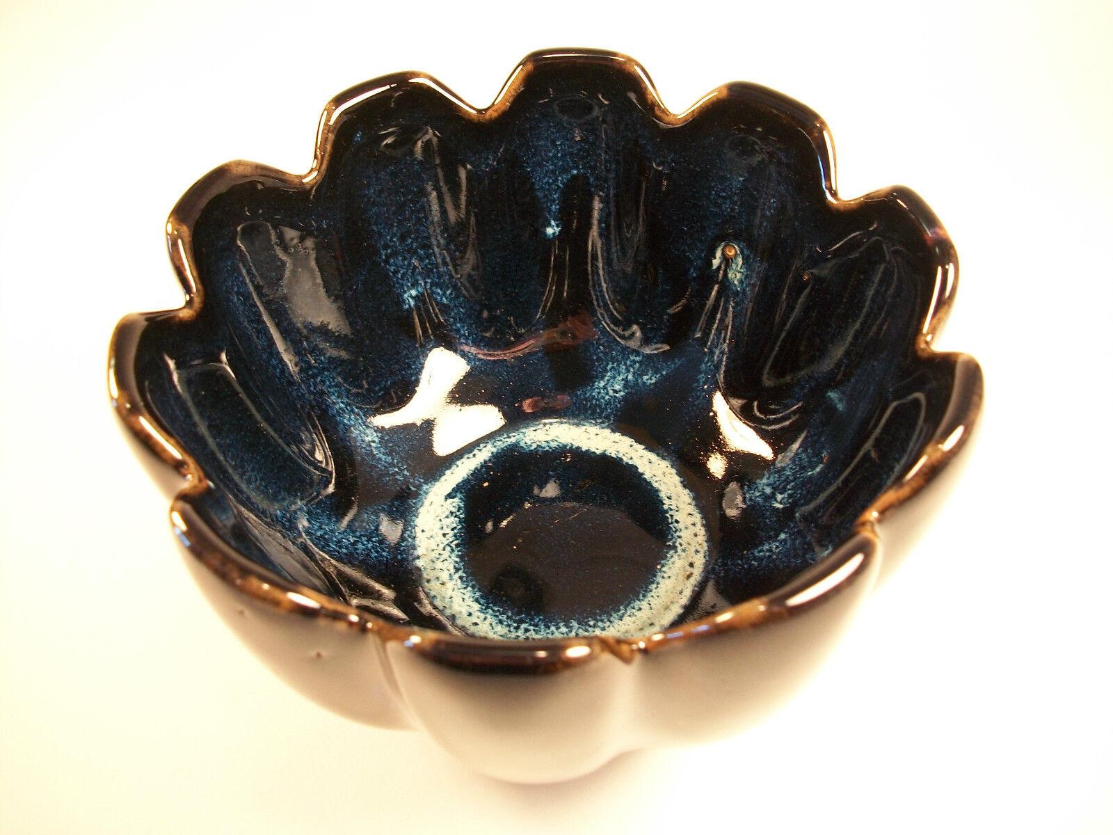 Vintage lotus form ceramic bowl - blue flambe glaze - non glazed foot rim - unsigned - China - late 20th century.

Excellent vintage condition - no chips - no cracks - no loss - no restoration - minor surface scratches from age and use.

Size -