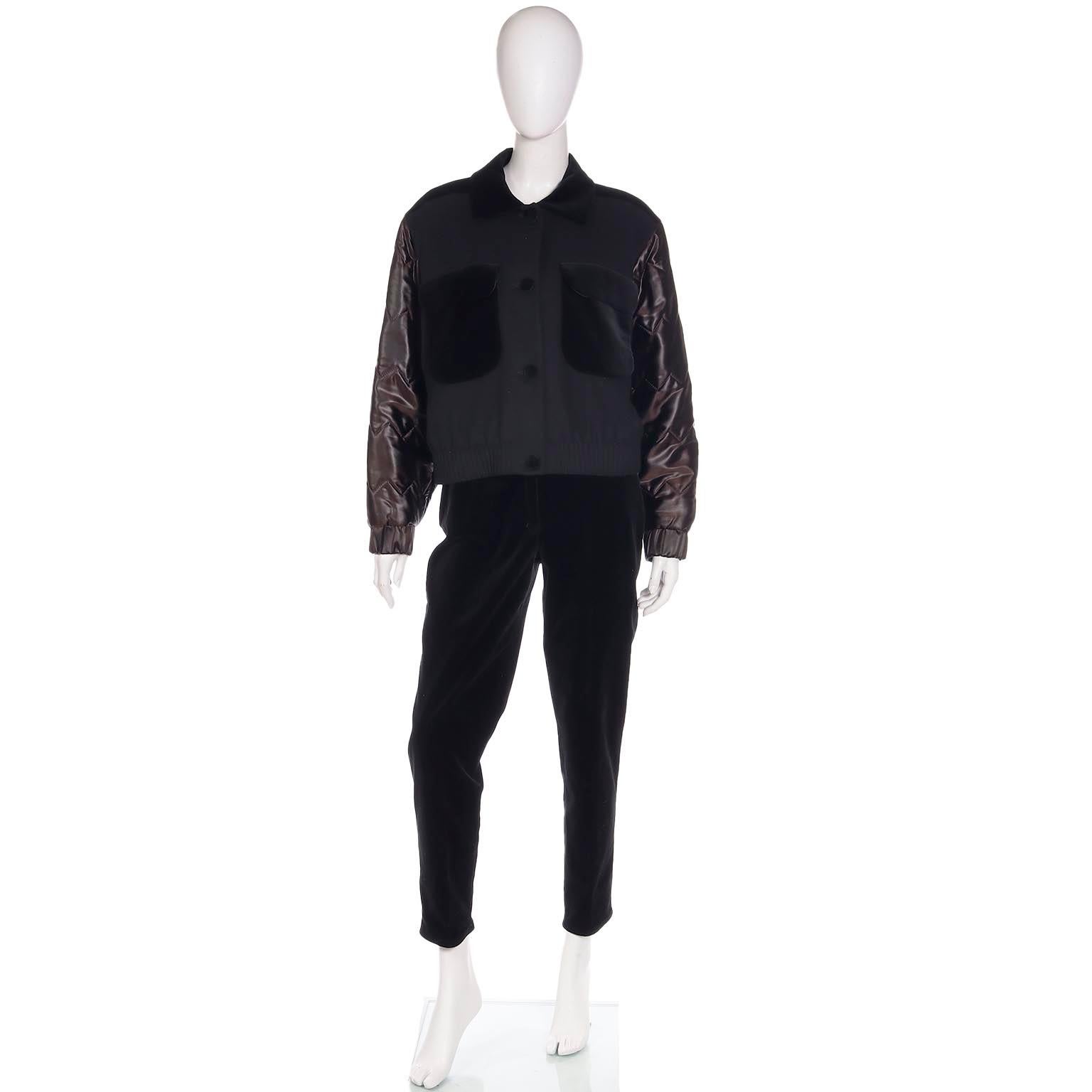 Ce costume 2 pièces Louis Feraud des années 1980 est en laine noire avec des bordures en velours de coton. L'ensemble comprend une veste bombardier facile à porter et un pantalon slim. Les pièces de Louis Feraud sont faites pour durer et nous