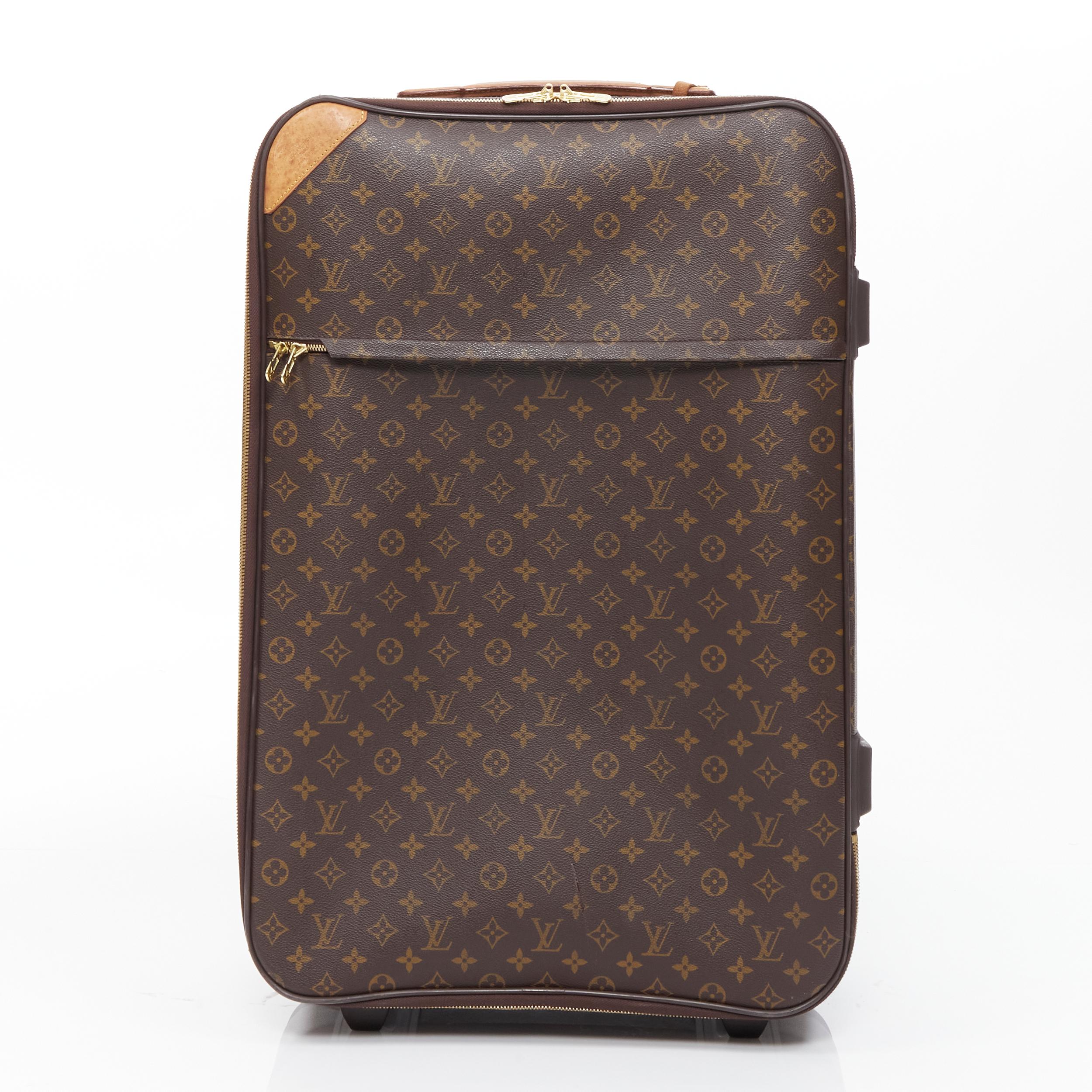 vintage LOUIS VUITON Pegase 70 brown LV monogram canvas rolling suitcase 
Reference: GIYG/A00100 
Brand: Louis Vuitton 
Model: Pegase 70 
Material: Canvas 
Color: Brown 
Pattern: Solid 
Closure: Zip 
Extra Detail: Pegase 70 is the largest size and