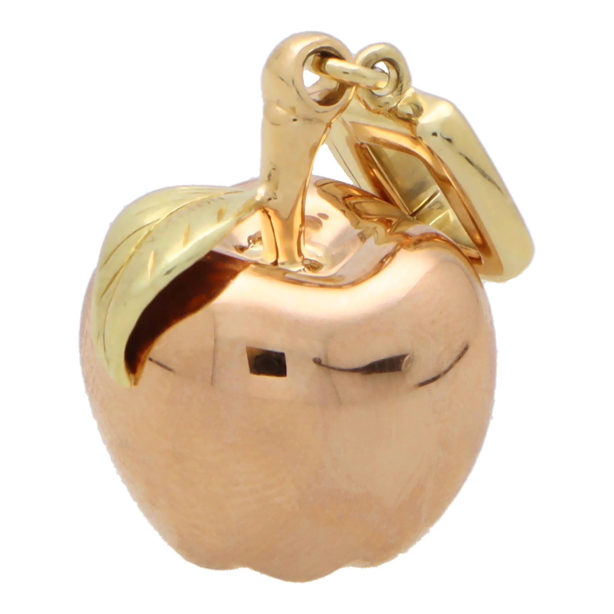 A beautiful vintage Louis Vuitton golden apple charm in 18k rose and yellow gold.

The charm is formed in an apple motif with the main body being made of 18k polished rose gold. The apple is accented with a carved yellow gold leaf where the brands