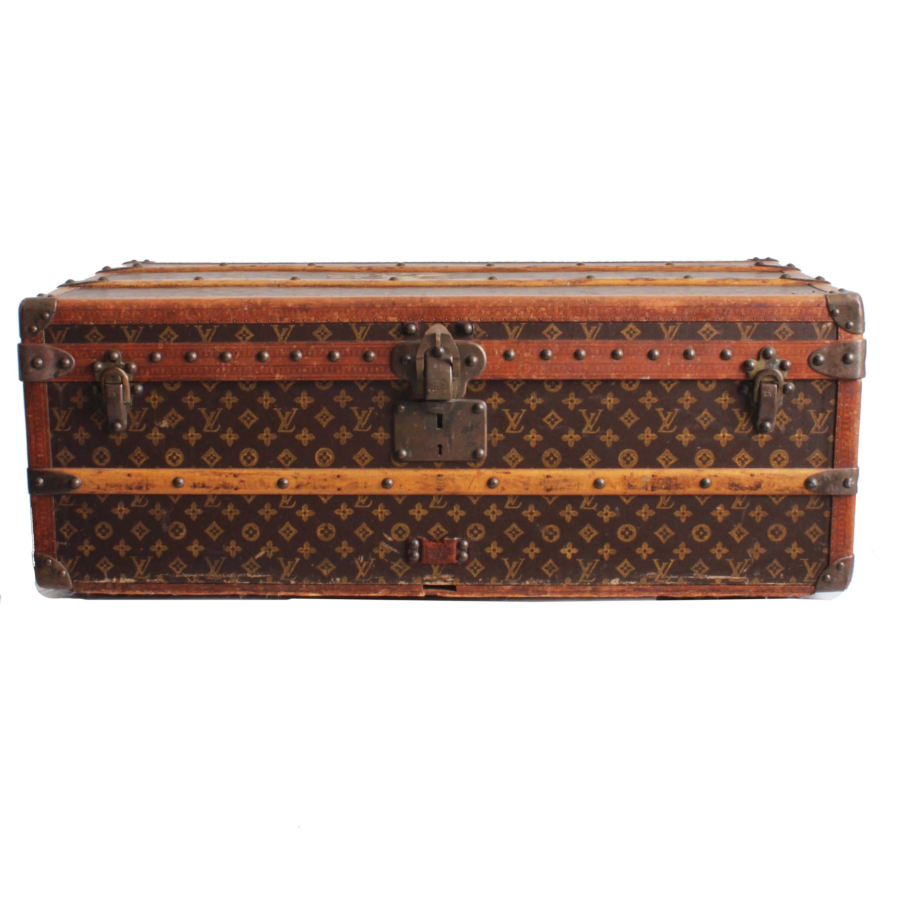Vintage Louis Vuitton Cabin Trunk with Insert, circa 1961.  Made from monogram canvas, leather LV stamped trim; lined in fabric; wheels on bottom.  A great example of Louis Vuitton's craftsmanship & while designed for travel, makes a fabulous piece