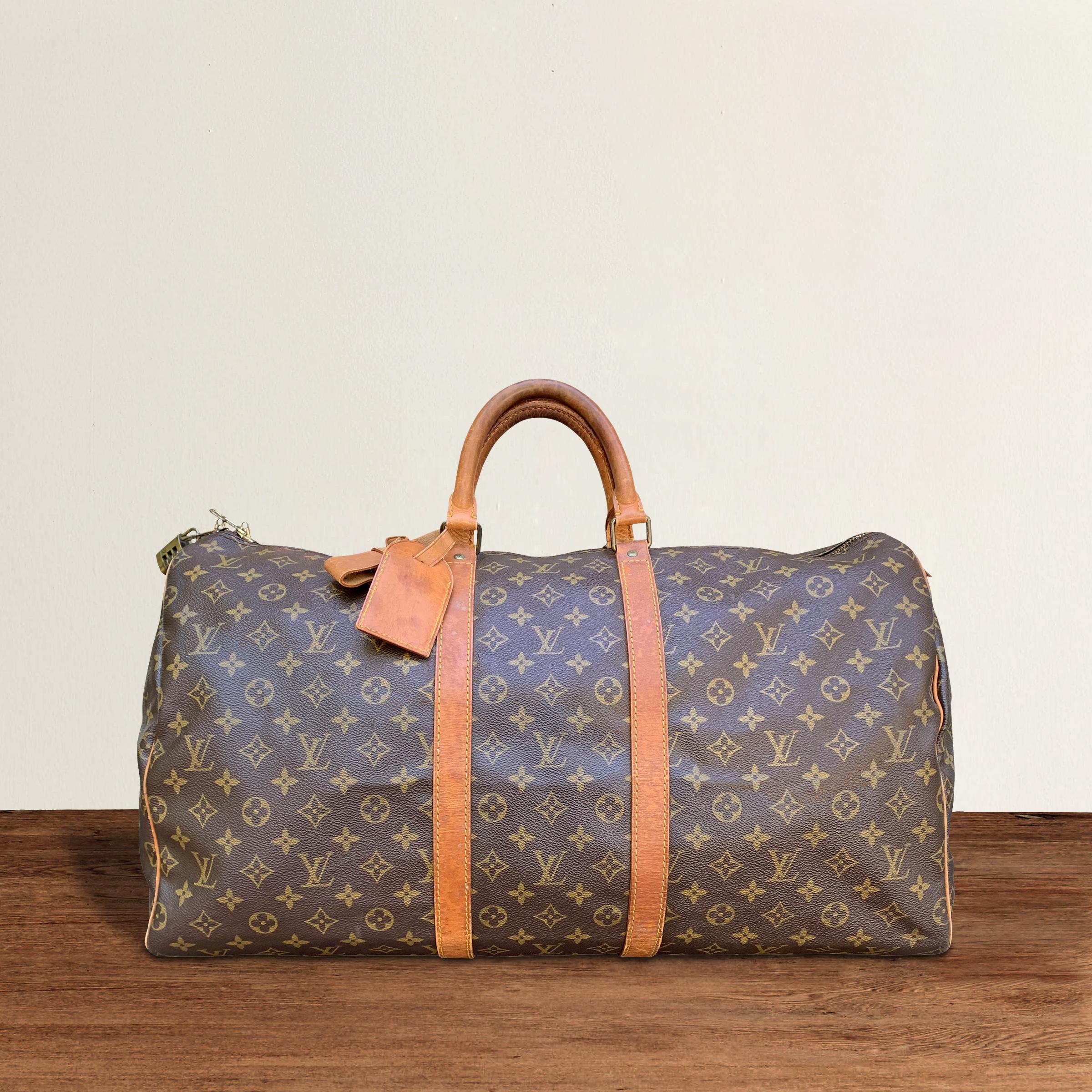 Vintage lv duffle bag hotsell