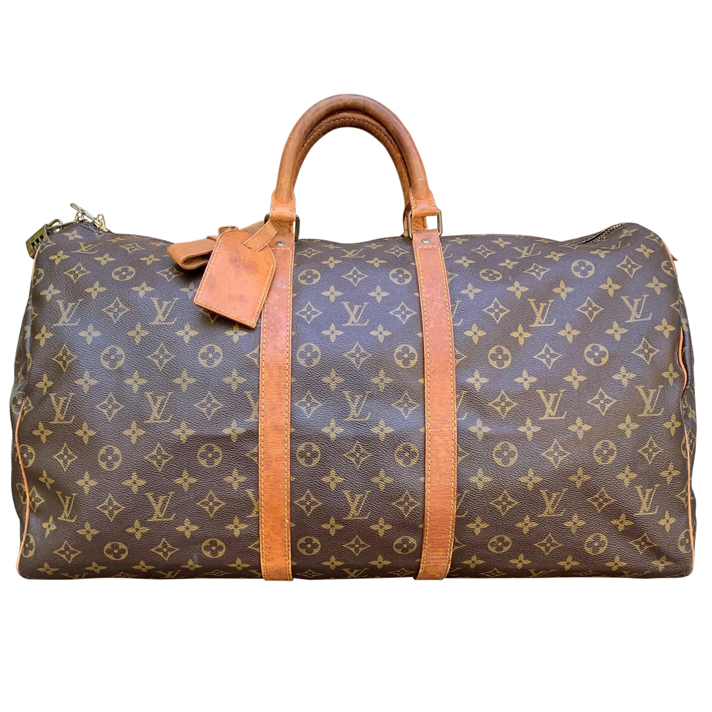 Sold at Auction: Vintage Louis Vuitton Duffle Bag