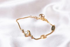 Vintage Louis Vuitton Gold Tone Pearl Charm Armband