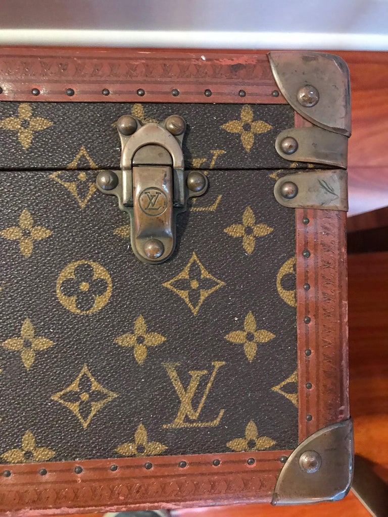 Past auction: Louis Vuitton monogrammed hardsided suitcase early 20th  century, index number 802032