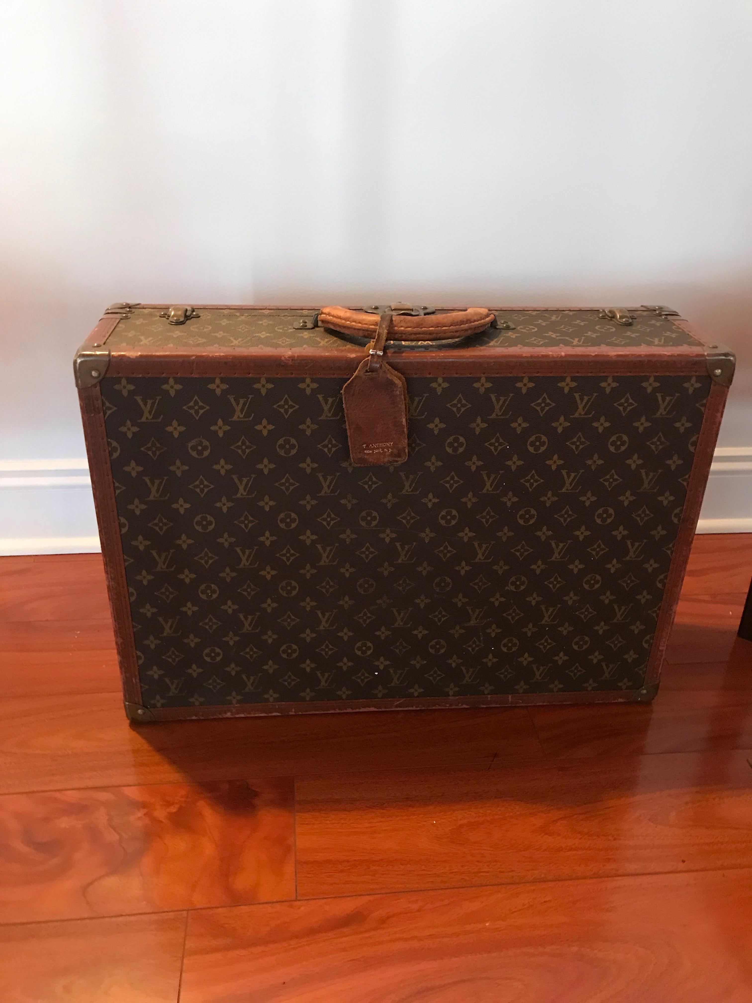 Brand: Louis Vuitton
Style: Bisten 60 vintage suitcase
Confirmed by Louis Vuitton Corporate, 1920s 
Condition: Fair/Good. From the estate of Henry Flager, who started Standard Oil in the late 1800s. 
Description: Interior clean with straps (see