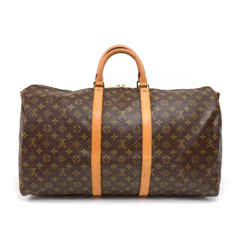 Vintage Louis Vuitton Keepall Bandouliere 55 a classic from the Louis Vuitton travel bag collection. This spacious sized version in Monogram canvas and a double zipper for secure and easy access. Great for any trip!  SKU: LP247

Made in: