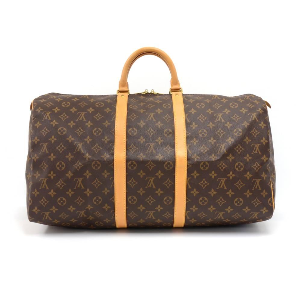 Vintage Louis Vuitton Keepall 55 is a classic of the Louis Vuitton travel bag collection. This spacious large sized version in Monogram canvas and a double brass zipper. A great companion wherever you go.It comes with name tag and poignees. SKU: