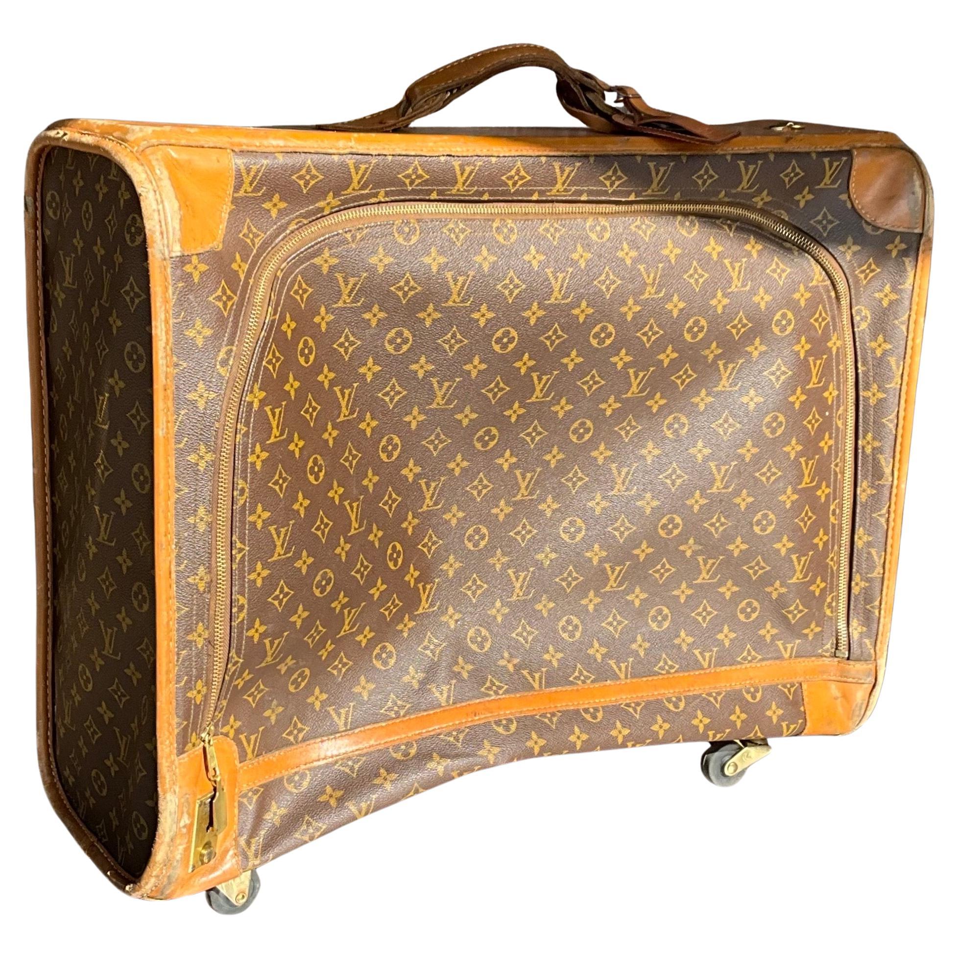 This Vintage Louis Vuitton Large Trunk with Wheels is a stunning and rare piece of luxury luggage that blends classic craftsmanship with modern functionality. 

Modern trunks are designed with wheels for easy mobility, but in vintage models, these