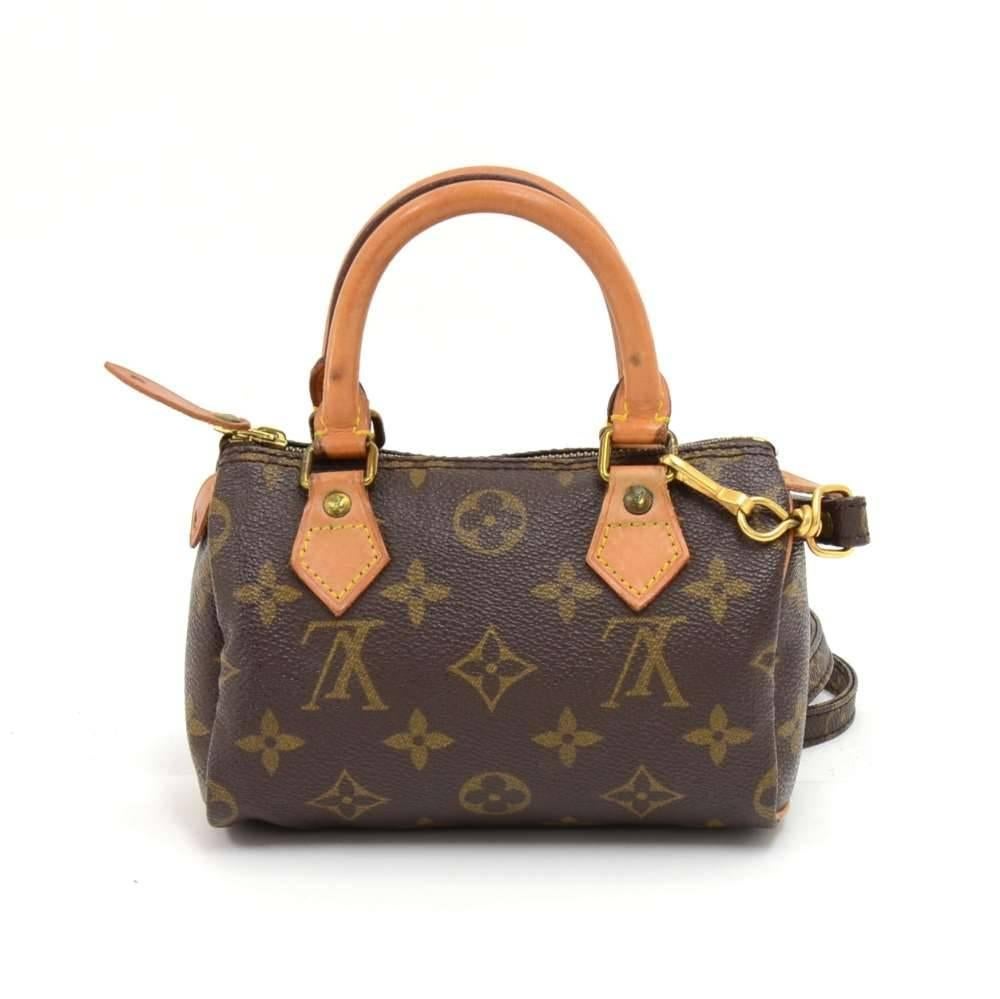 Vintage Louis Vuitton handbag Mini Speedy Sac HL, one of the most popular line in LV monogram canvas. Brass zipper securing access. Inside is in brown lining. Very cute item to have. Comes with detachable canvas strap with a shoulder support pad.