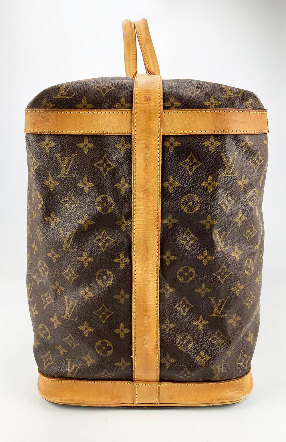 Vintage Louis Vuitton Monogram Cruiser 45 Travel Tote in fair condition. Signature monogram canvas exterior trimmed with tan leather and golden brass hardware. This is a rare vintage design from Louis Vuitton. It's not longer made or sold in stores.